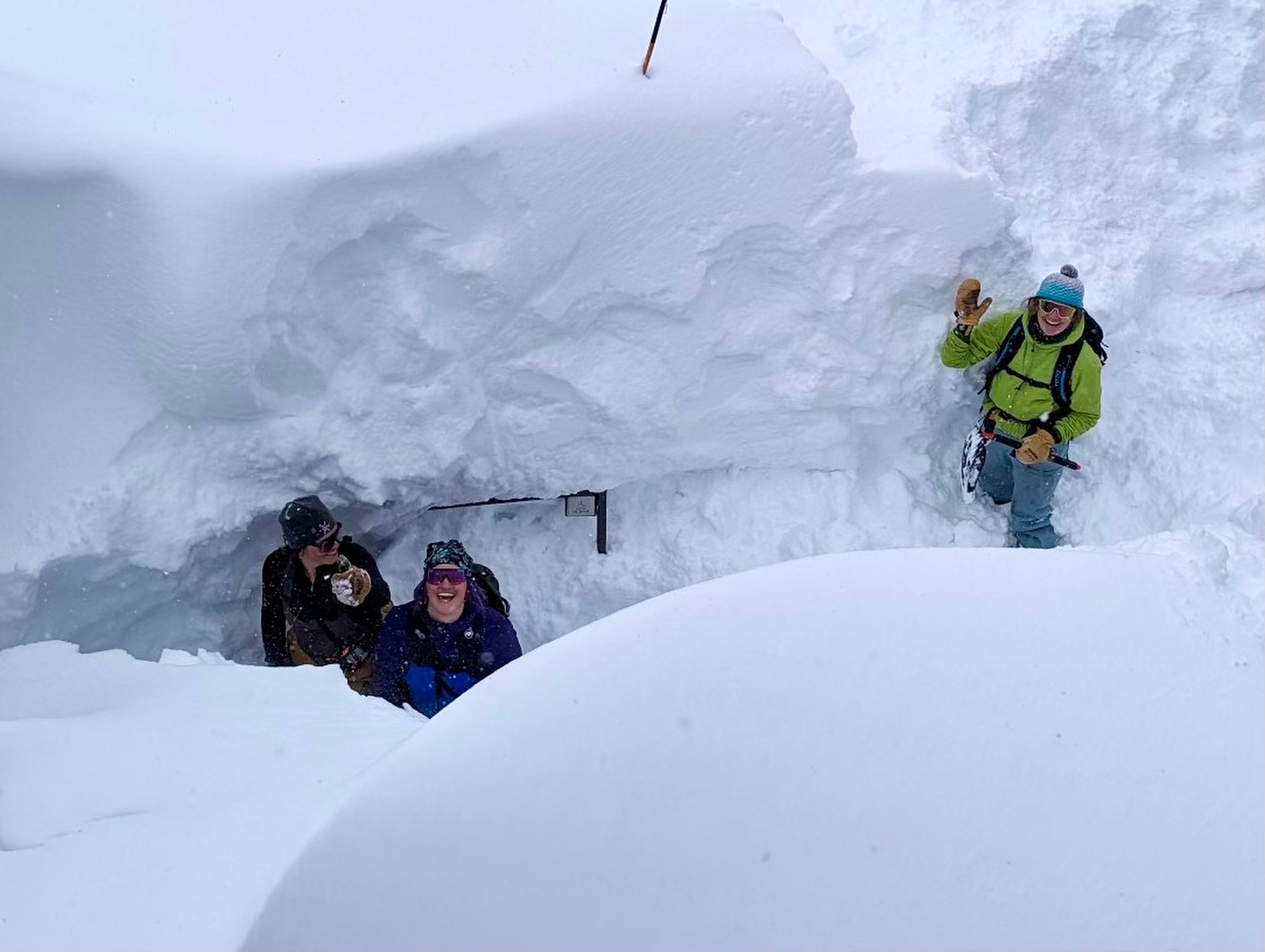 Alta Lodge staff members dig out the hotel during a significant snowstorm that caused multiday road closures and interlodge restrictions in Little Cottonwood Canyon between April 3 and April 7. Employees and guests are finally able to come back down Little Cottonwood Canyon with the reopening of state Route 210.