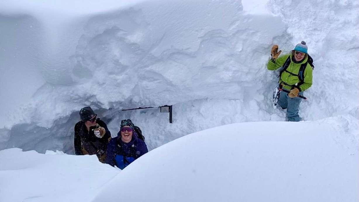 Alta Lodge staff members dig out the hotel during a significant snowstorm that caused multiday road closures and interlodge restrictions in Little Cottonwood Canyon between April 3 and April 7. Employees and guests are finally able to come back down Little Cottonwood Canyon with the reopening of state Route 210.