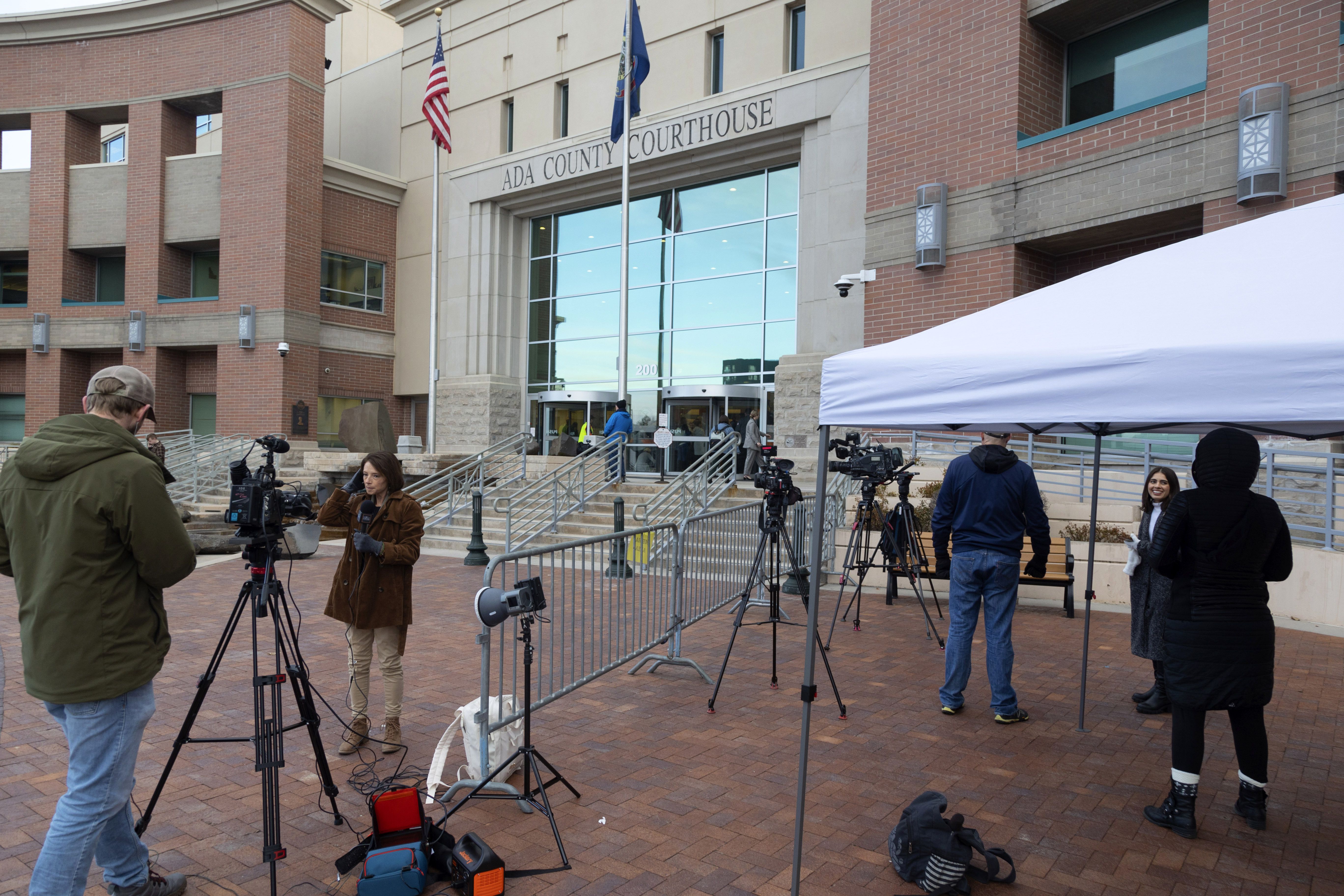 Media members gather outside the Ada County courthouse in Boise on Monday on the first day of jury selection in the Lori Vallow Daybell murder trial. A jury has been seated in the trial.