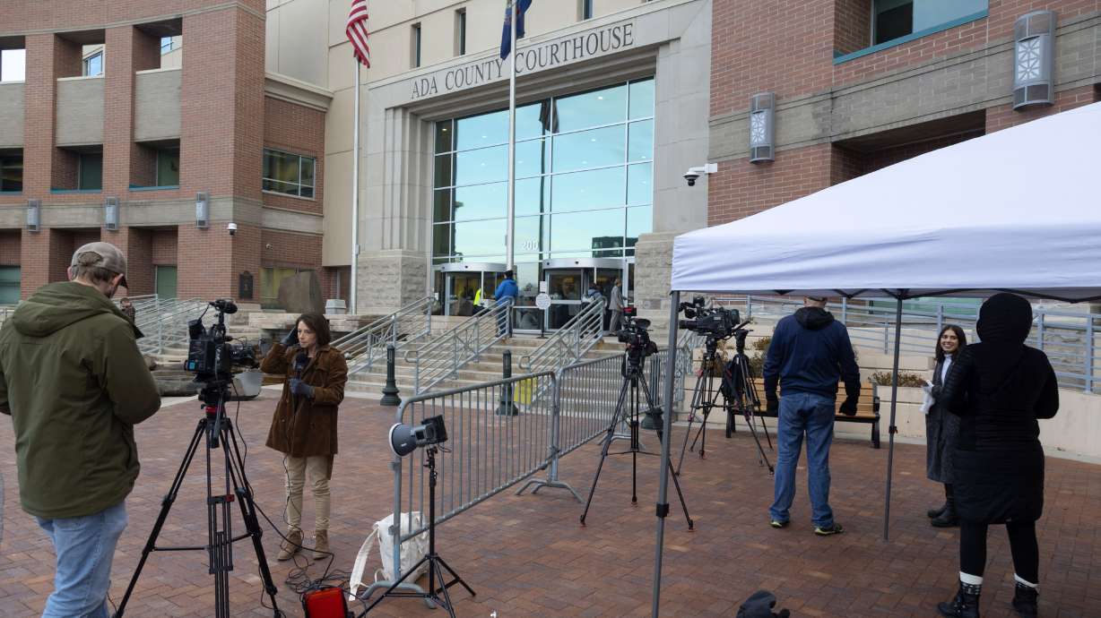 Media members gather outside the Ada County courthouse in Boise on Monday on the first day of jury selection in the Lori Vallow Daybell murder trial. A jury has been seated in the trial.