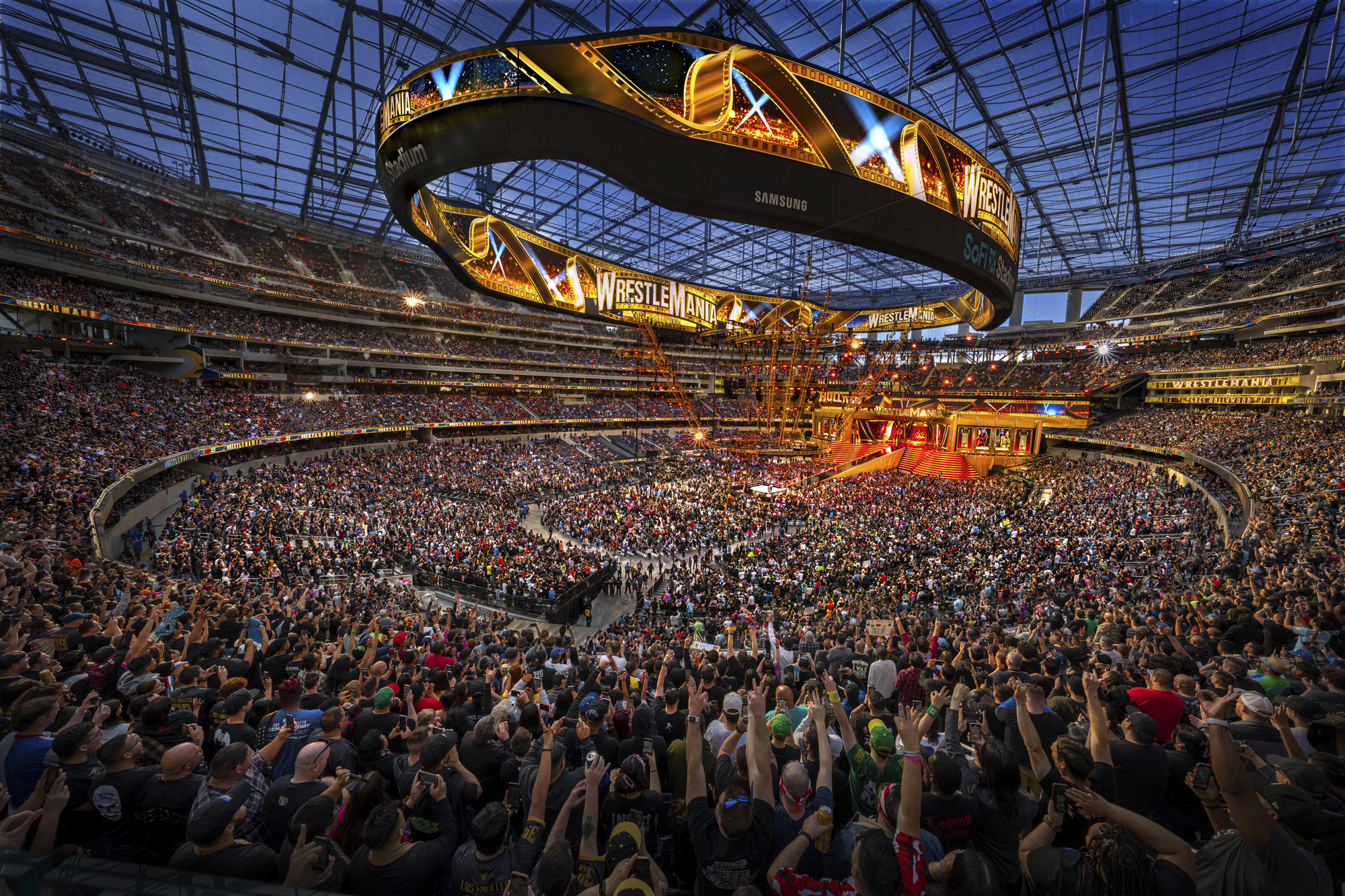 In this photo provided by WWE, Over 80,000 attend the first night of WrestleMania 39 at SoFi Stadium in Inglewood, Calif., Saturday, April 1, 2023. It was announced Monday that Endeavor had signed an agreement with WWE to form a new, publicly listed company that will house UFC and WWE under one roof.