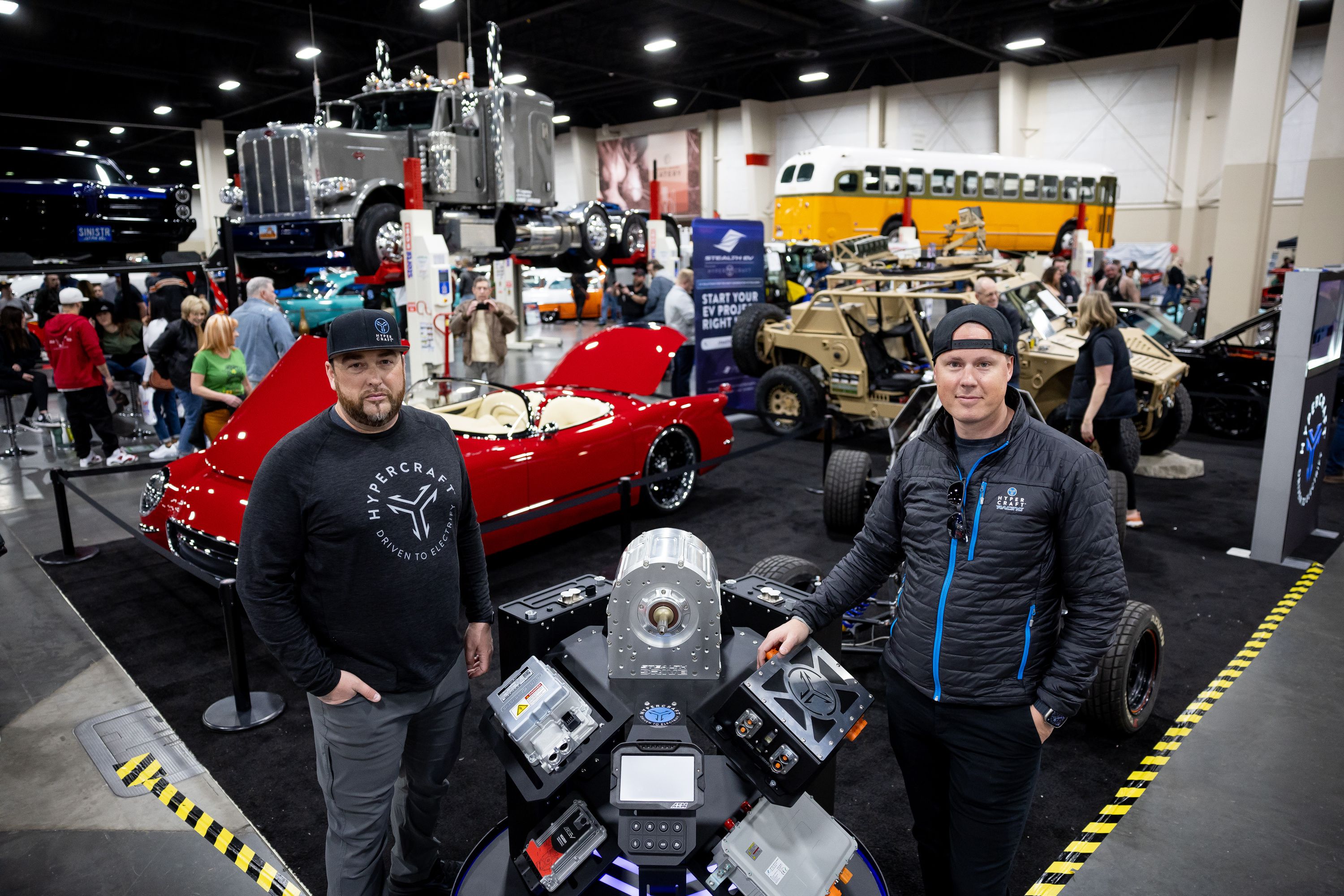 Hypercraft co-founders Jonathon Miller, left, and Jake Hawksworth, right, pose for a photo at the company’s display at the AutoRama car show at the Mountain America Expo Center in Sandy on Saturday, March 4.