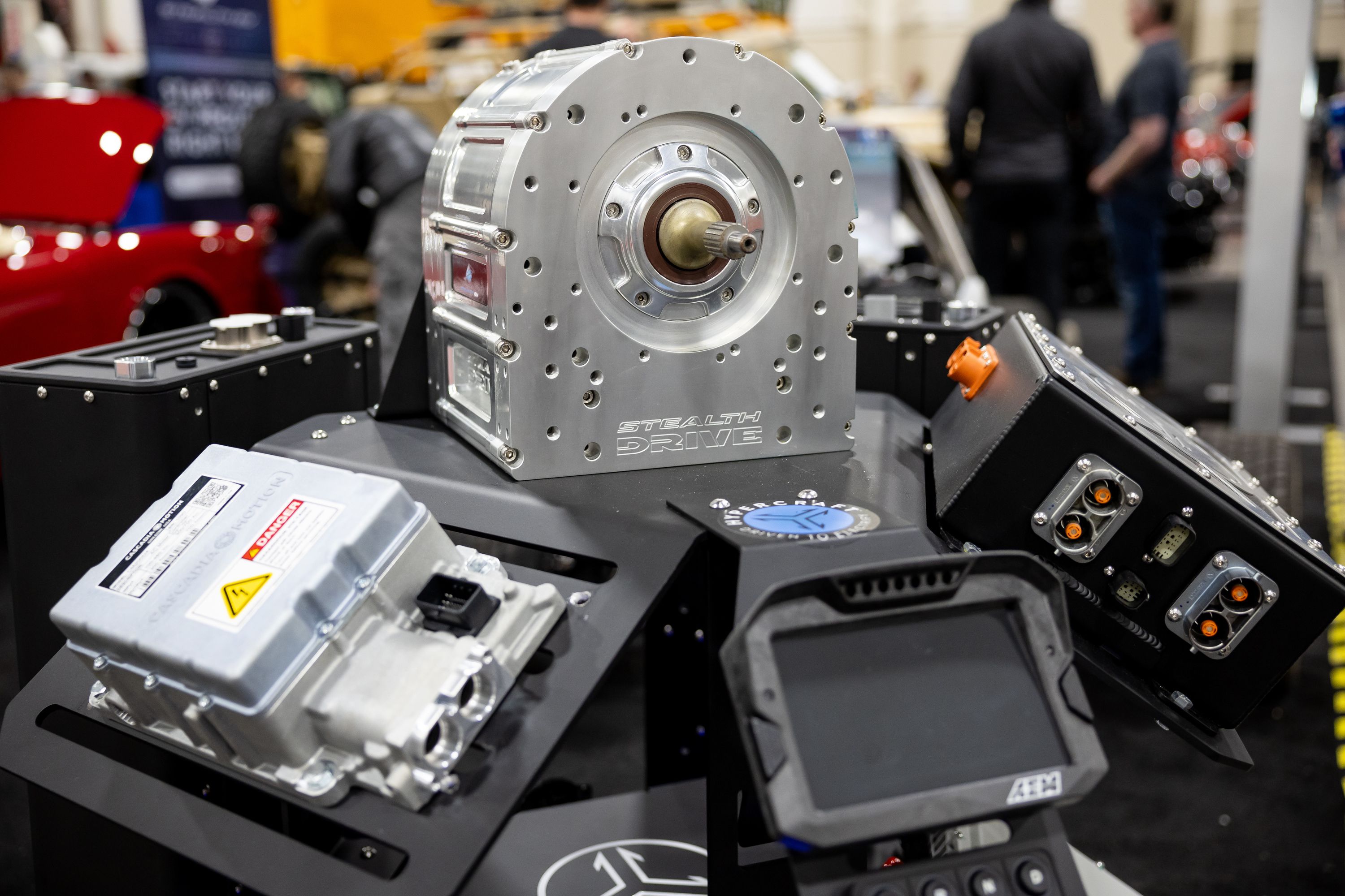Electric vehicle components are displayed at Hypercraft’s booth at the AutoRama car show at the Mountain America Expo Center in Sandy on Saturday, March 4.