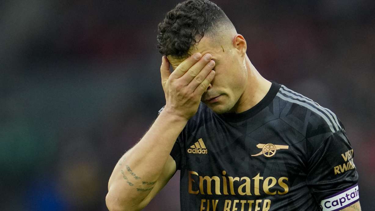 Arsenal's Granit Xhaka reacts at the end of the English Premier League soccer match between Liverpool and Arsenal at Anfield in Liverpool, England, Sunday, April 9, 2023.