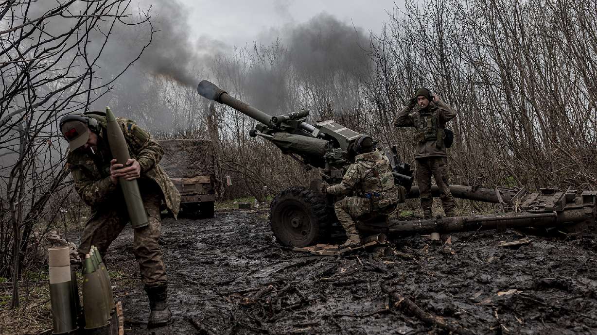 Ukrainian soldiers of the Da Vinci Wolves Battalion fire artillery in the direction of Bakhmut on April 3. Highly classified Pentagon documents leaked online in recent weeks have provided a rare window into how the US spies on allies and foes alike