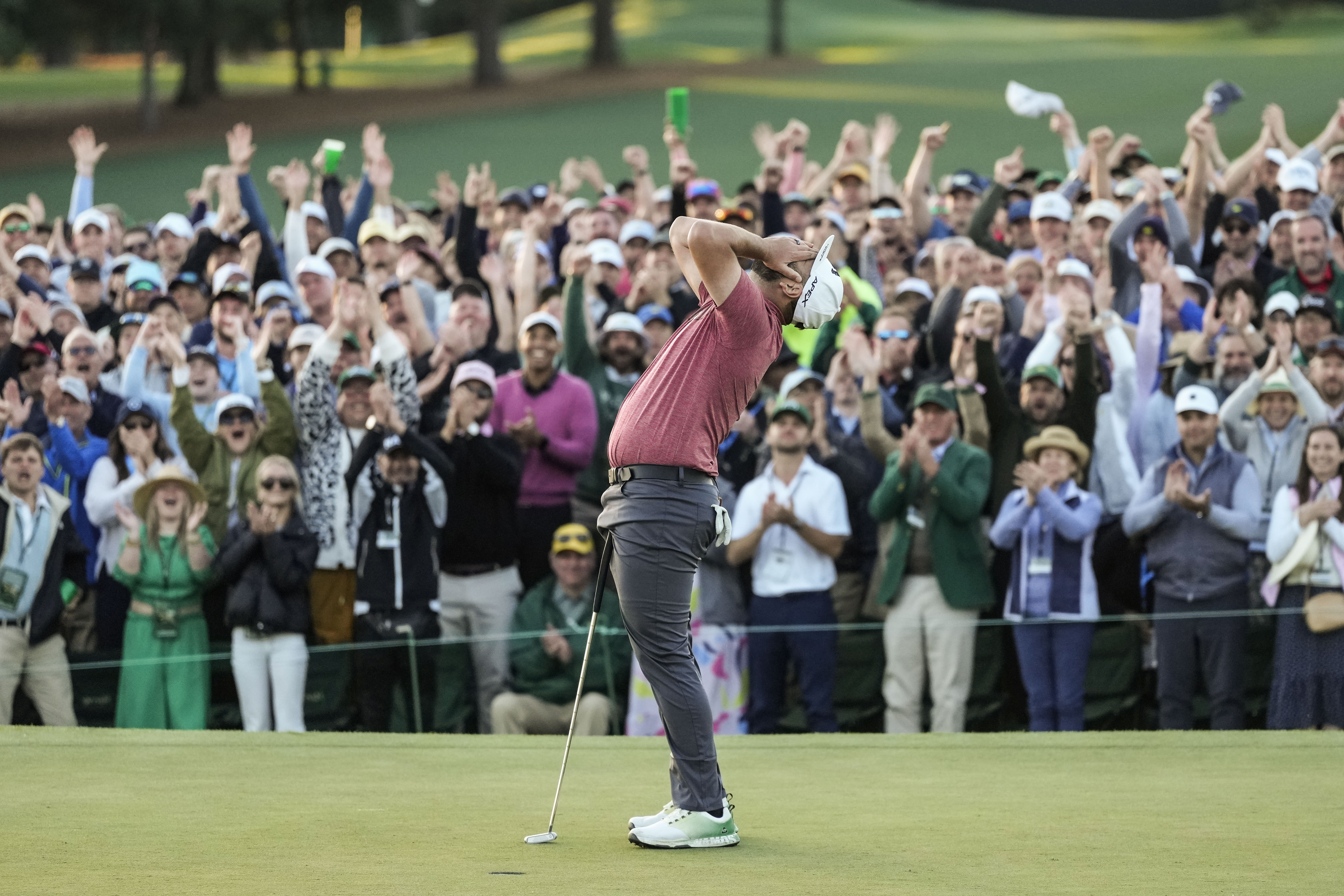 Jon Rahm, of Spain, celebrates on the 18th green after winning the Masters golf tournament at Augusta National Golf Club on Sunday, April 9, 2023, in Augusta, Ga.