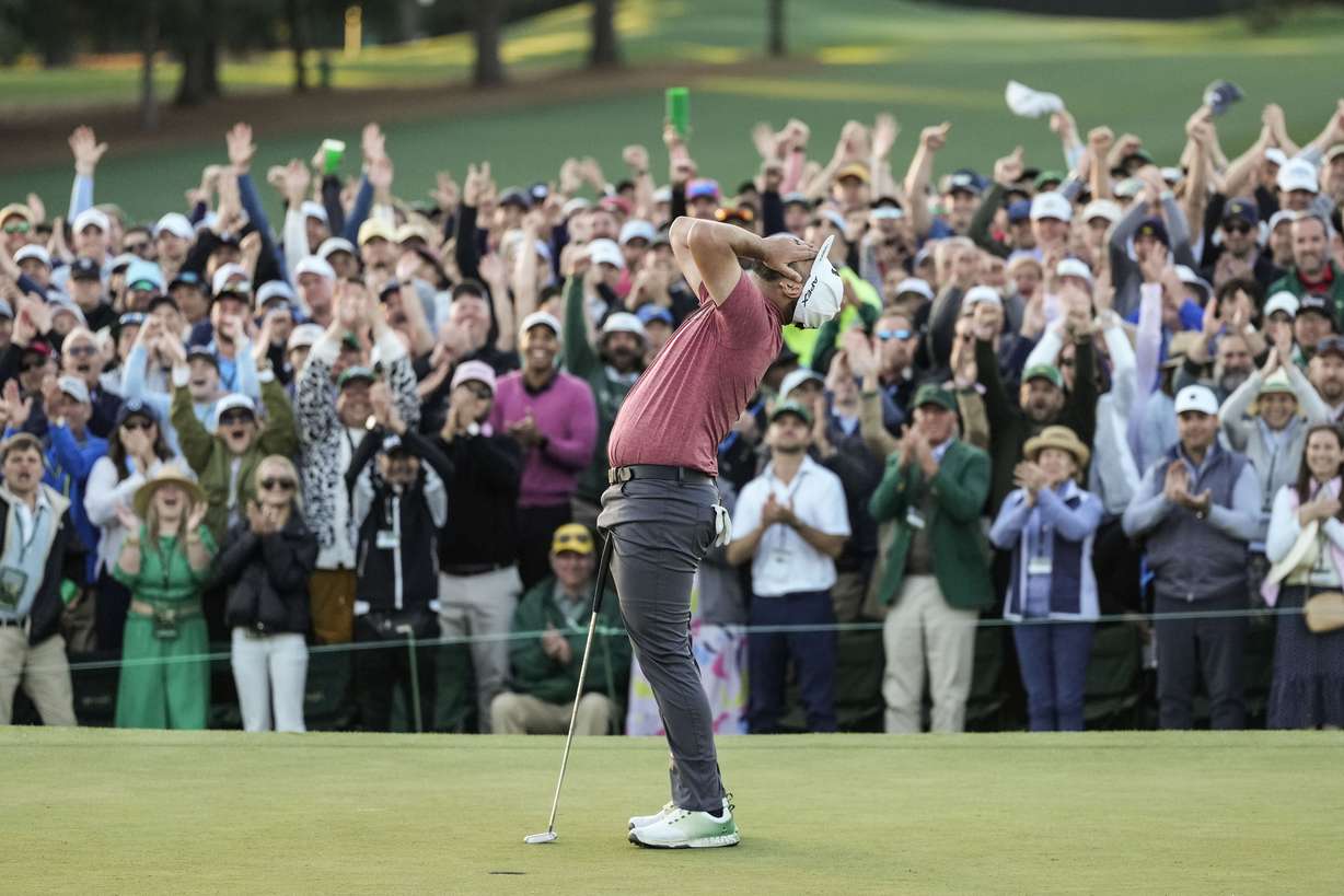Jon Rahm, of Spain, celebrates on the 18th green after winning the Masters golf tournament at Augusta National Golf Club on Sunday, April 9, 2023, in Augusta, Ga.