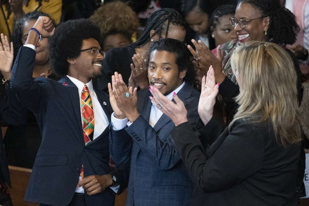 Expelled Rep. Justin Pearson, D-Memphis, from left, expelled Rep. Justin Jones, D-Nashville, and Rep. Gloria Johnson, D-Knoxville, are recognized by the audience at Fisk University before Vice President Kamala Harris arrives, Friday, April 7, in Nashville, Tenn.