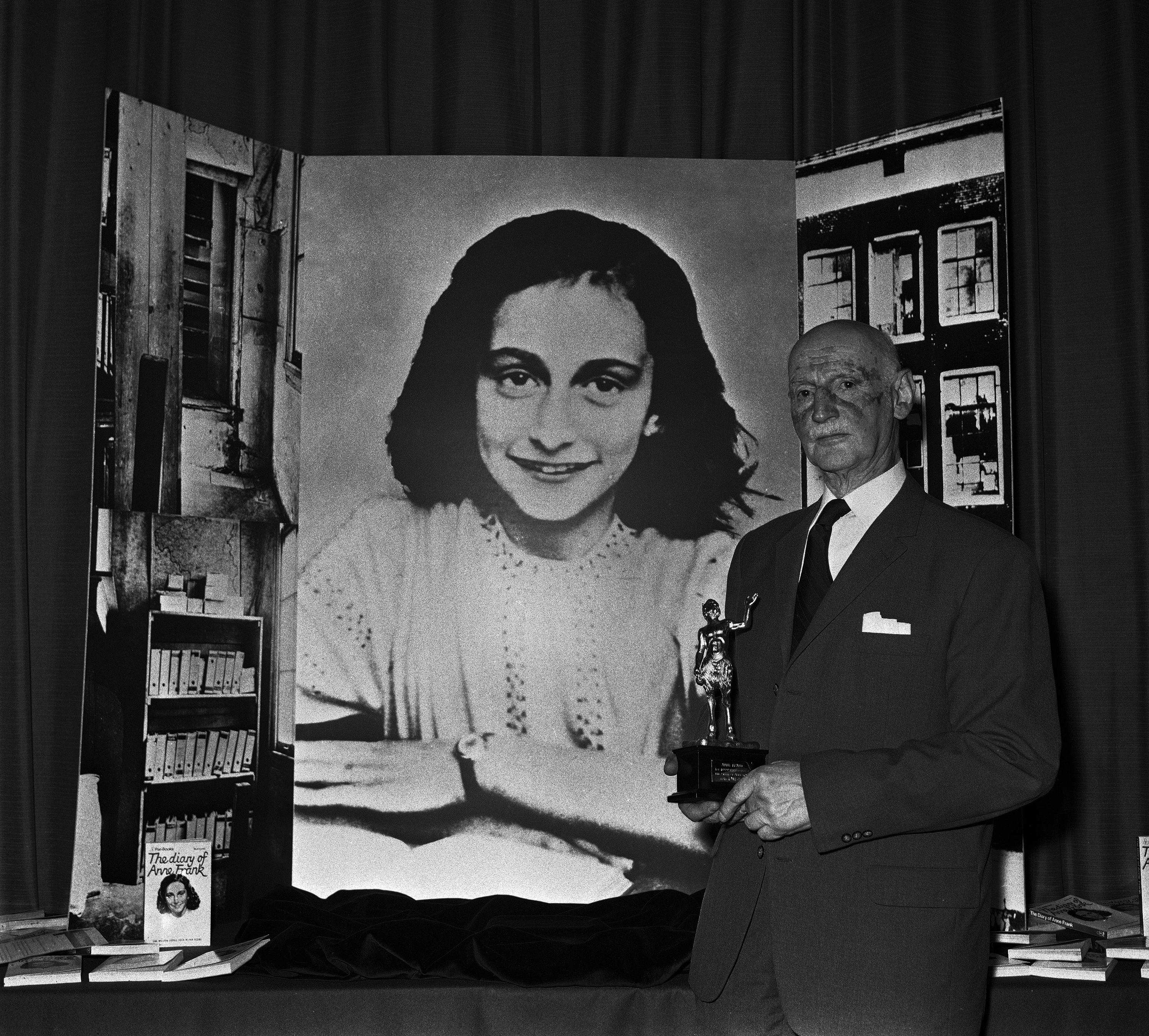 Dr. Otto Frank holds the Golden Pan award for the sale of 1 million copies of "The Diary of Anne Frank." A high school along Florida’s Atlantic Coast has removed a graphic novel based on the diary of Anne Frank after a leader of a conservative group challenged it.