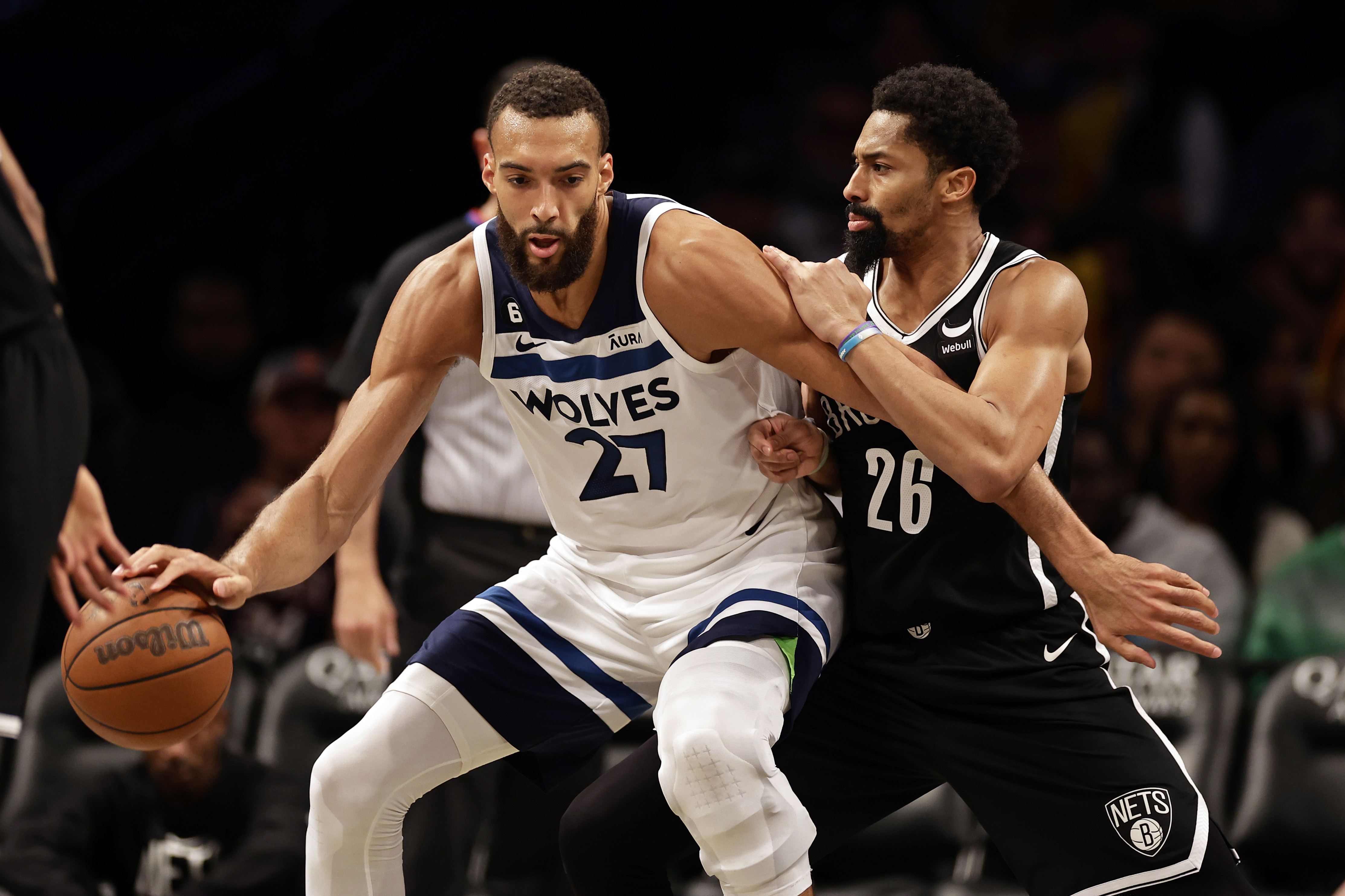 Minnesota Timberwolves center Rudy Gobert (27) drives to the basket against Brooklyn Nets guard Spencer Dinwiddie during the second half of an NBA basketball game, Tuesday, April 4, 2023, in New York. 