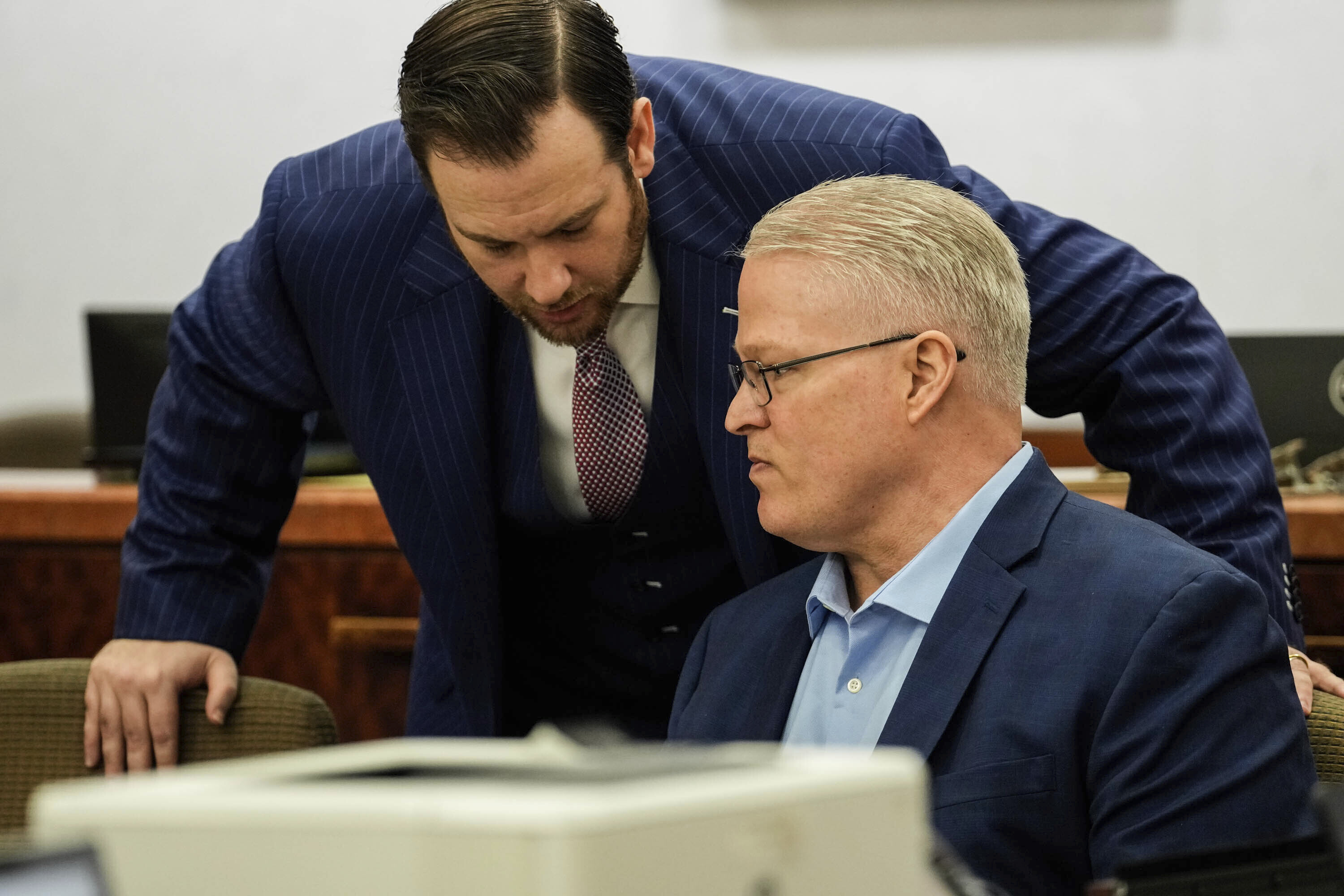 Defense attorney Romy Kaplan, left, speaks to client David Temple during his sentencing trial in the Harris County 178th District Criminal Court Monday April 10, 2023 in Houston. David Temple was convicted for the second time for the murder of his pregnant wife, Belinda Lucas Temple, in Aug. 2019, but the sentencing was postponed due to the COVID-19 pandemic. 