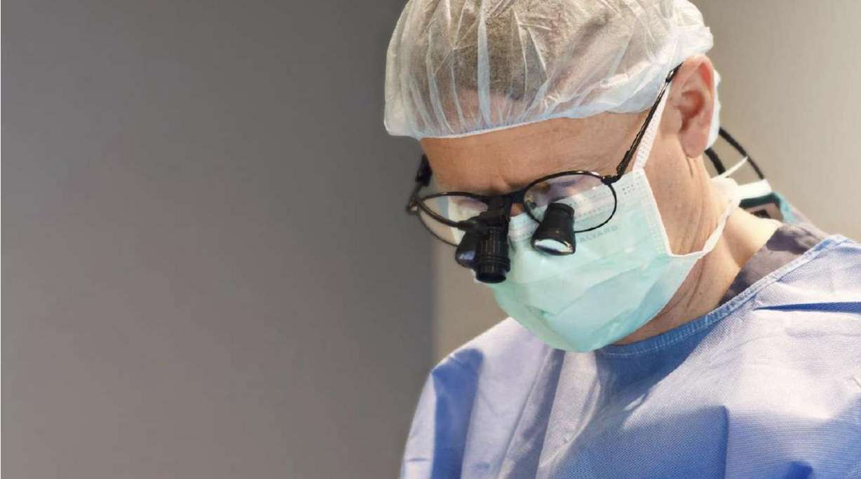 Dr. Peterson performing surgery.