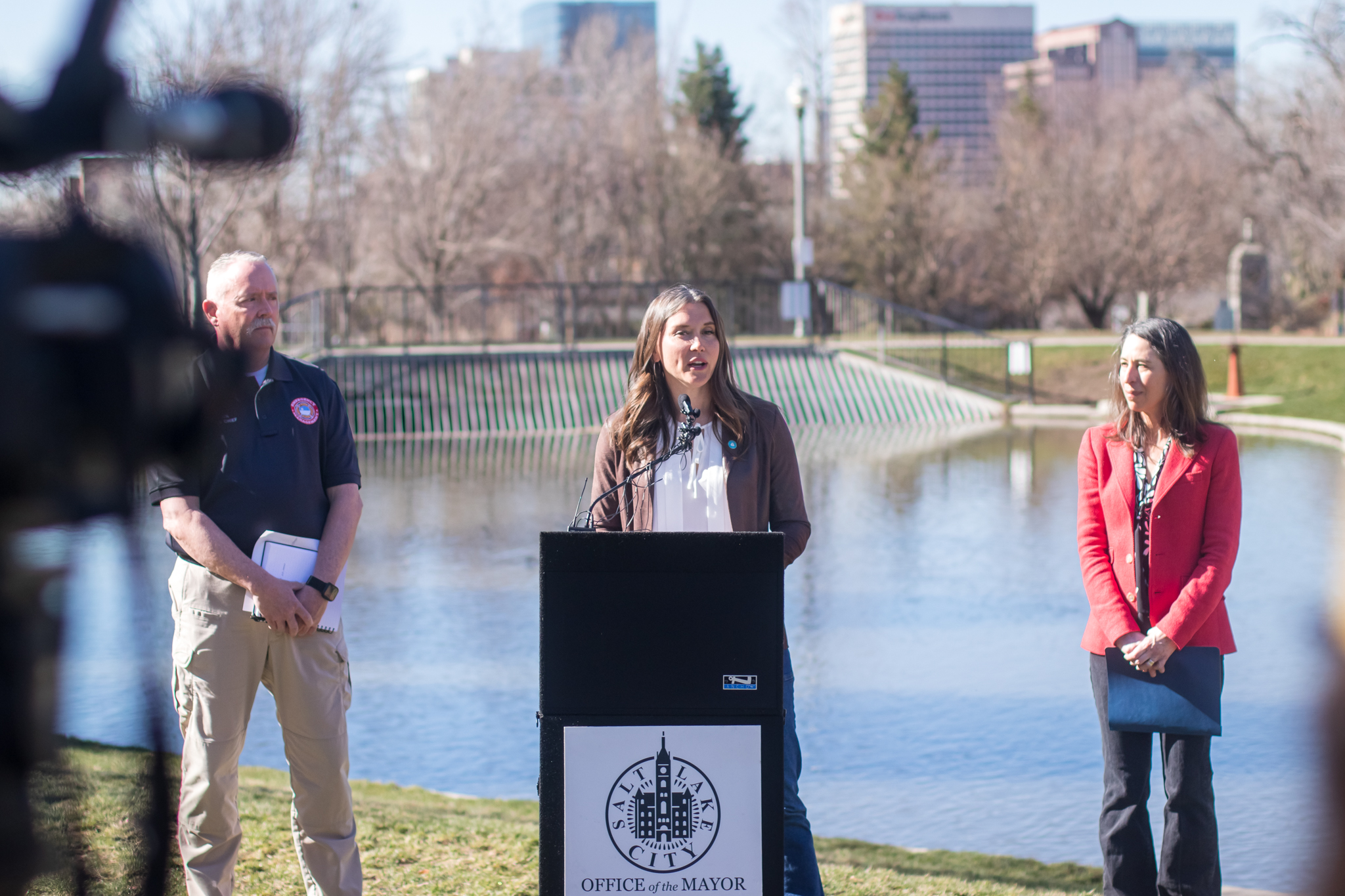 Salt Lake City Mayor Erin Mendenhall, center, speaks at a flooding prevention event at Memory Grove in Salt Lake City on Monday. Laura Briefer, the director of Salt Lake City Public Utilities, right, and Salt Lake City emergency manager Richard Boden, left, are also pictured.
