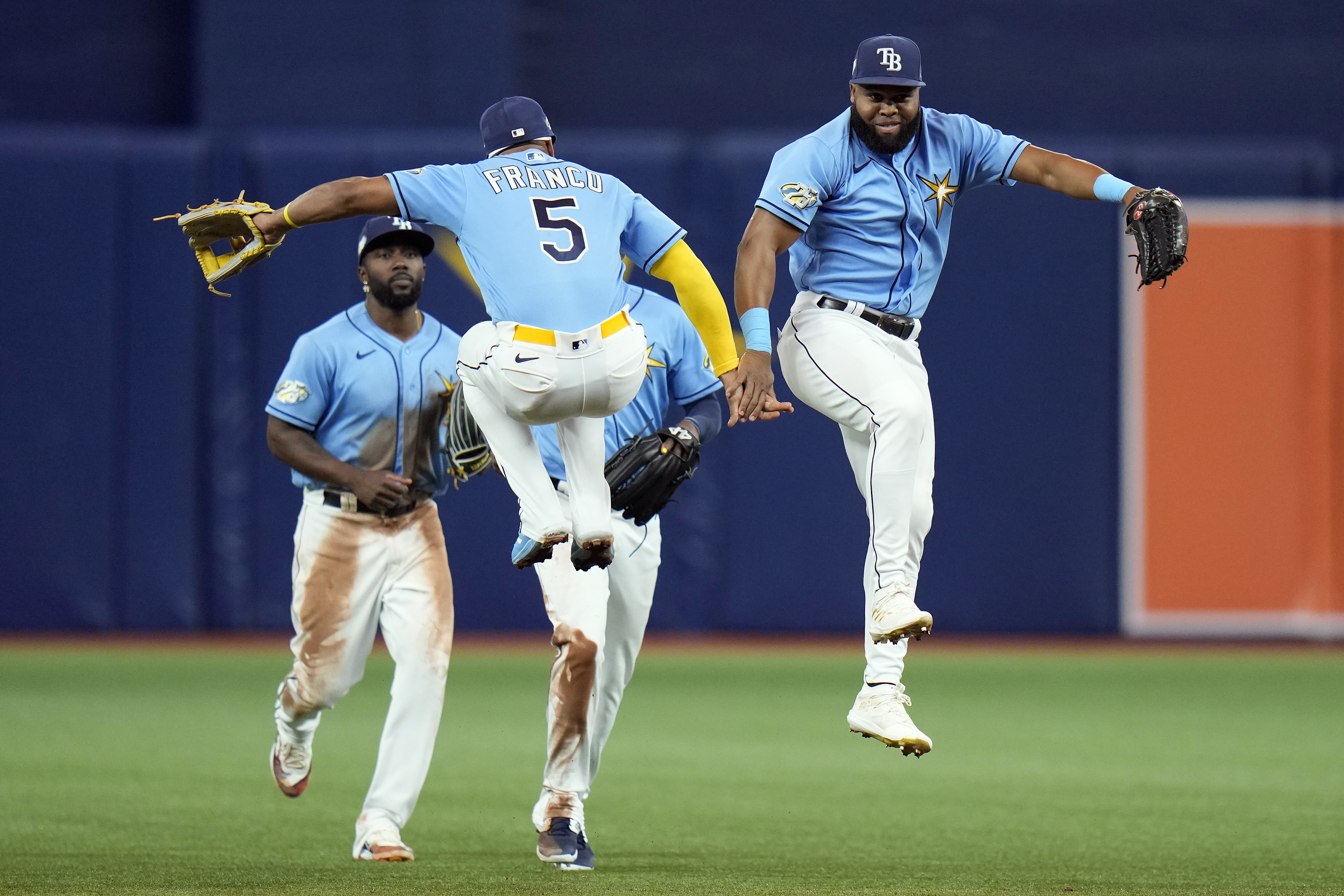 Tampa Bay Rays outfielder Manuel Margot celebrates with shortstop Wander Franco (5) after the Rays defeated the Boston Red Sox during a baseball game Monday, April 10, 2023, in St. Petersburg, Fla.