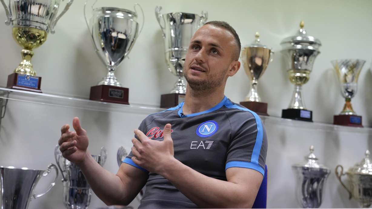 Napoli's Stanislav Lobotka is interviewed by the Associate Press at the end of a training session at the club headquarters in Castel Volturno, near Naples, Wednesday, April 5, 2023. Unlike other major cities in Italy, Naples has only one major soccer team and the fan support for Napoli is felt on every street and alleyway. Lobotka, who developed with Ajax’s junior squad and then played for Danish club Nordsjaelland and Spanish side Celta Vigo before transferring to Italy, had never experienced anything like Napoli.