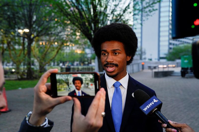 Rep. Justin J. Pearson speaks to media after Rep. Justin Jones was reinstated days after both of them were expelled for their roles in a gun control demonstration on the statehouse floor, in Nashville, Tennessee, Monday. Tennessee Democrats on Tuesday will press for his reinstatement. 