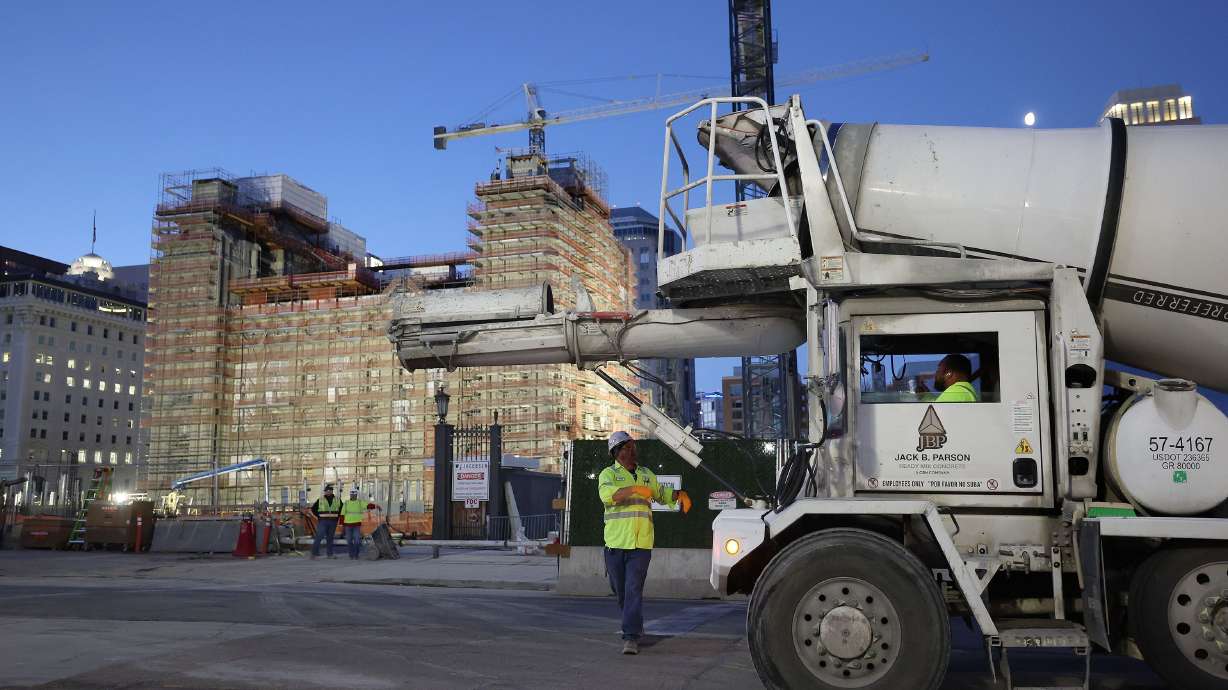 A truck enters Temple Square to pour concrete at the Salt Lake Temple of The Church of Jesus Christ of Latter-day Saints on Tuesday.