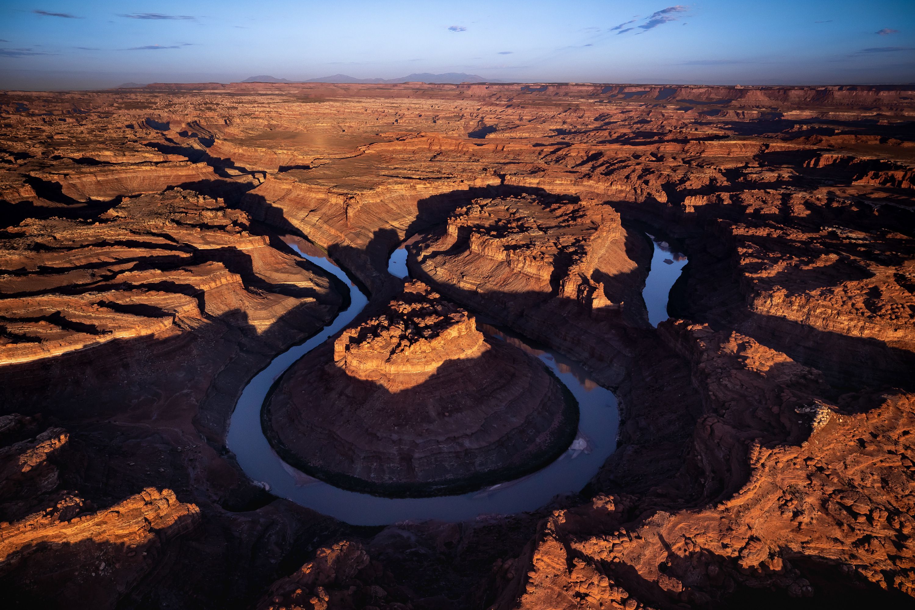The Colorado River cuts its path through southern Utah near Moab on July 22, 2022. The Department of the Interior and the Bureau of Reclamation unveiled proposed alternatives Tuesday that could reduce water consumption beginning in 2024.