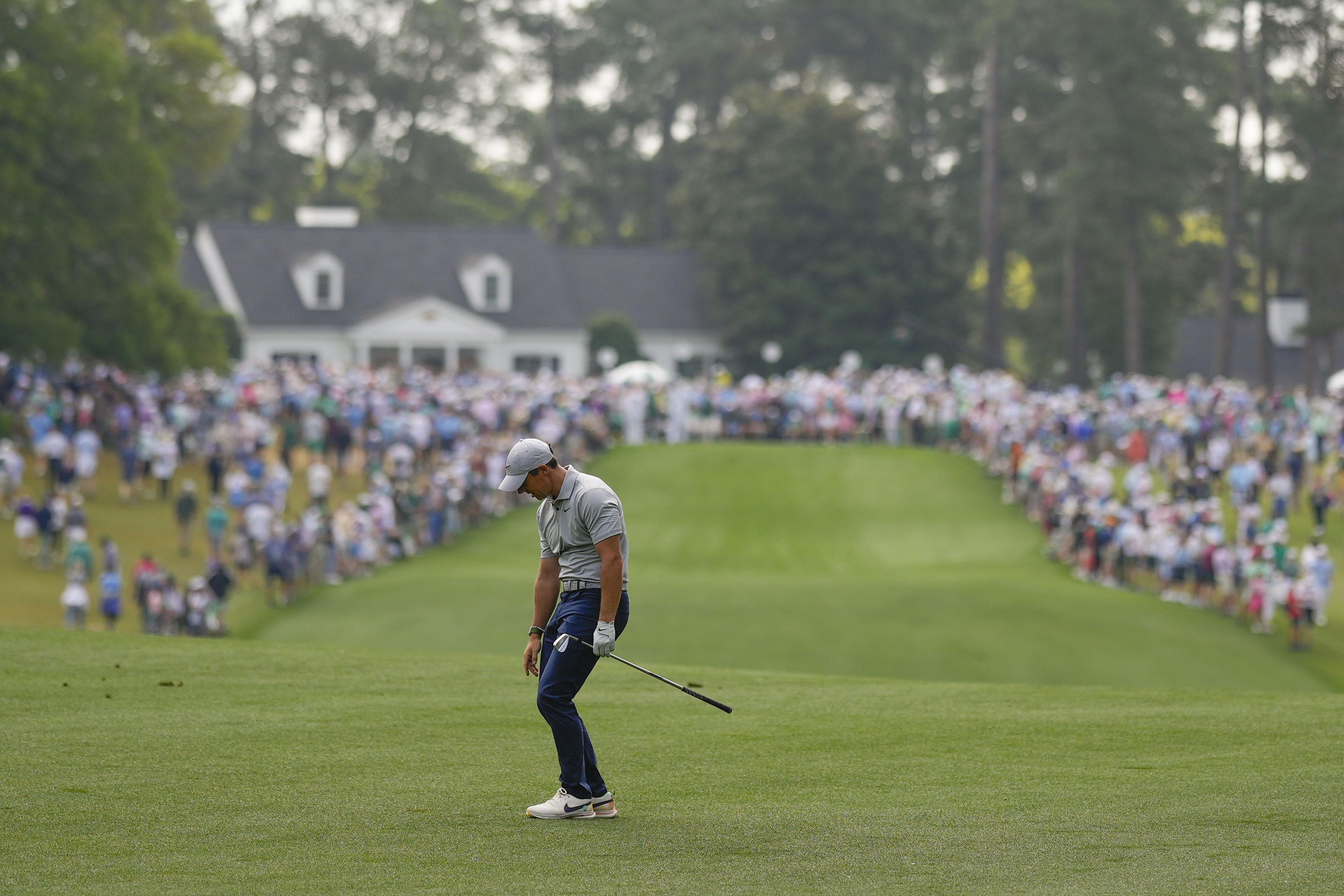 Rory McIlroy, of Northern Ireland, reacts to his shot on the first hole during the second round of the Masters golf tournament at Augusta National Golf Club on Friday, April 7, 2023, in Augusta, Ga. 