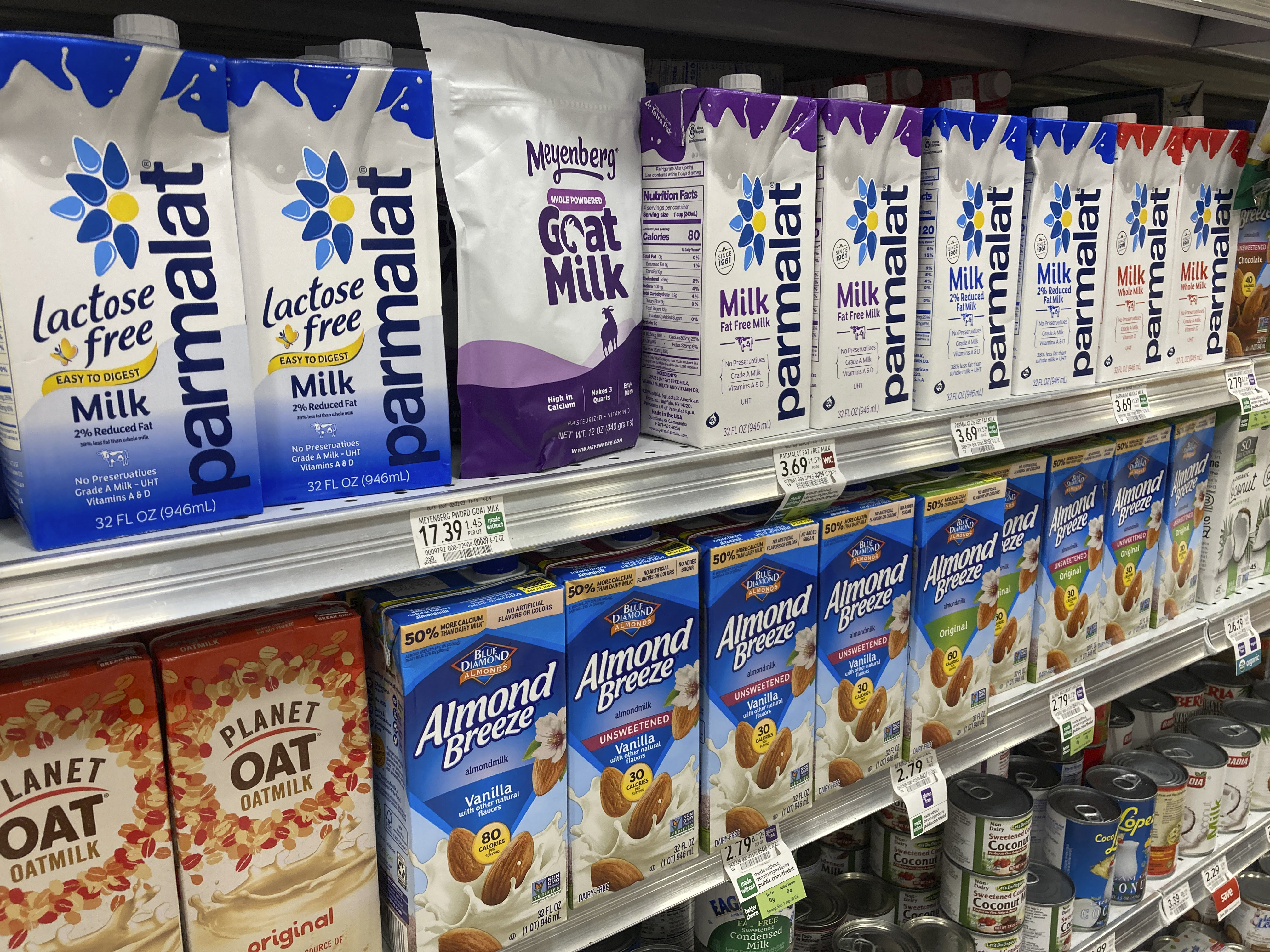 Boxed milk products are shown in a grocery store, Tuesday, in Surfside, Fla. On Wednesday, the Labor Department reported on U.S. consumer prices for March.