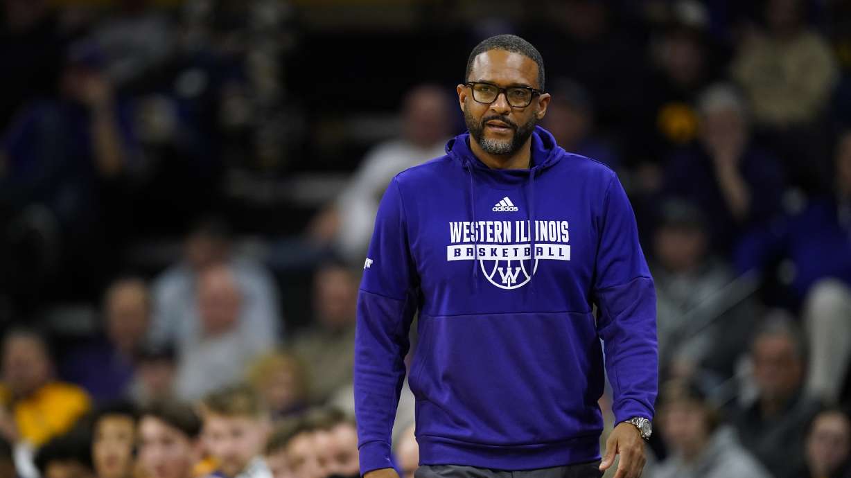 Western Illinois head coach Rob Jeter watches from the bench during the second half of an NCAA college basketball game against Iowa, Dec. 29, 2021, in Iowa City, Iowa. Jeter was named head coach at Southern Utah late Tuesday night.