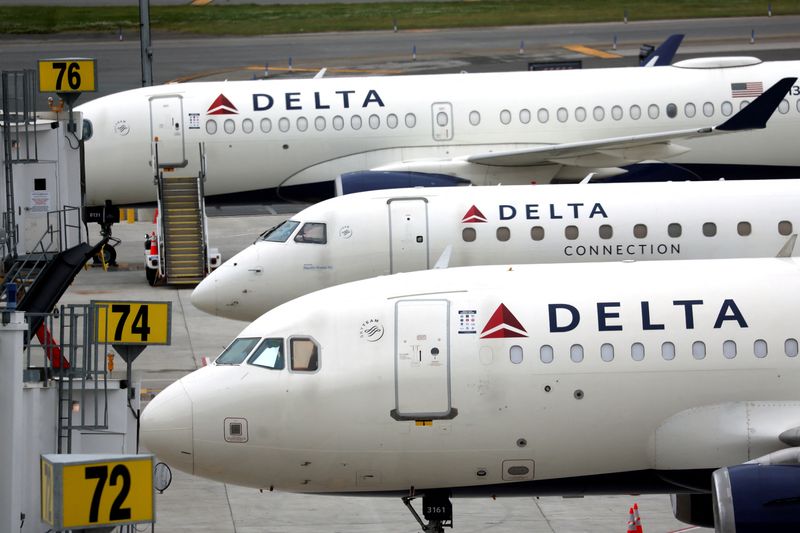 Delta Airlines jets at LaGuardia Airport in New York City, N.Y. June 1, 2022. Delta  is doubling down on more profitable premium travel.