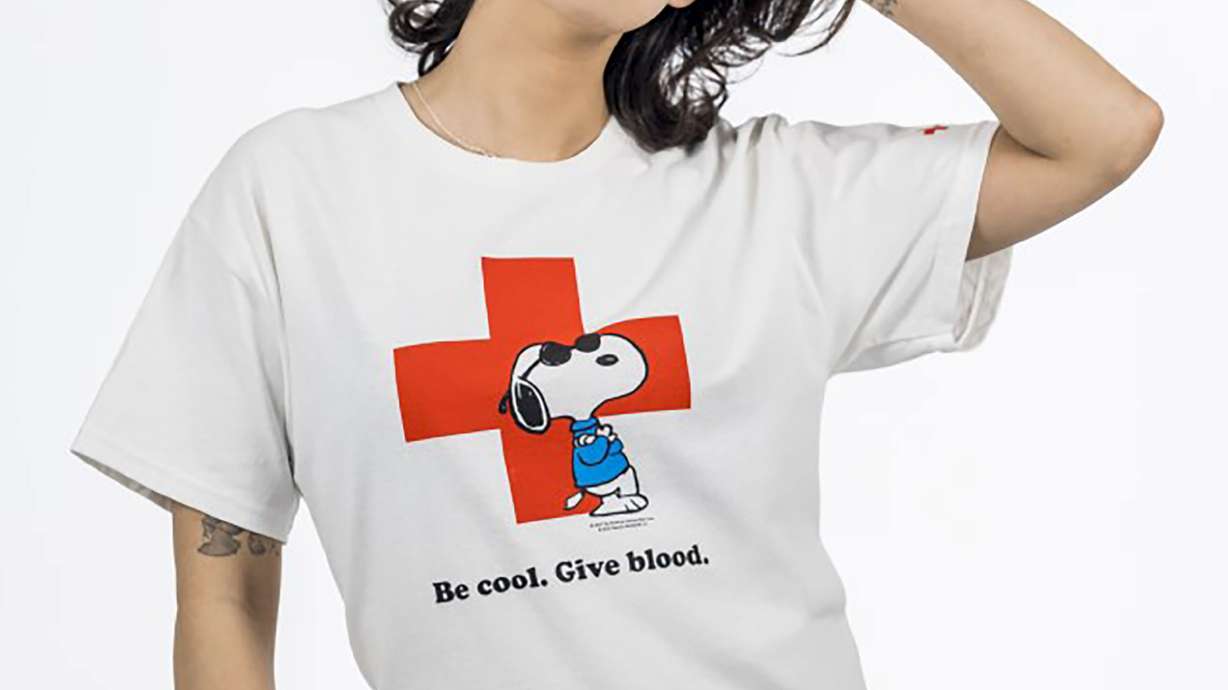 This Red Cross Snoopy shirt has gone viral in recent days, igniting an uptick in blood donations.