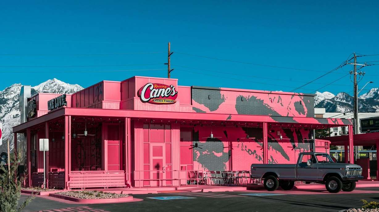 The exterior of a newly renovated, Post Malone-themed Raising Cane's is pictured in Midvale. Post Malone and chicken finger enthusiasts will now be able to celebrate both at a newly renovated Post Malone-themed Raising Cane's in Midvale.