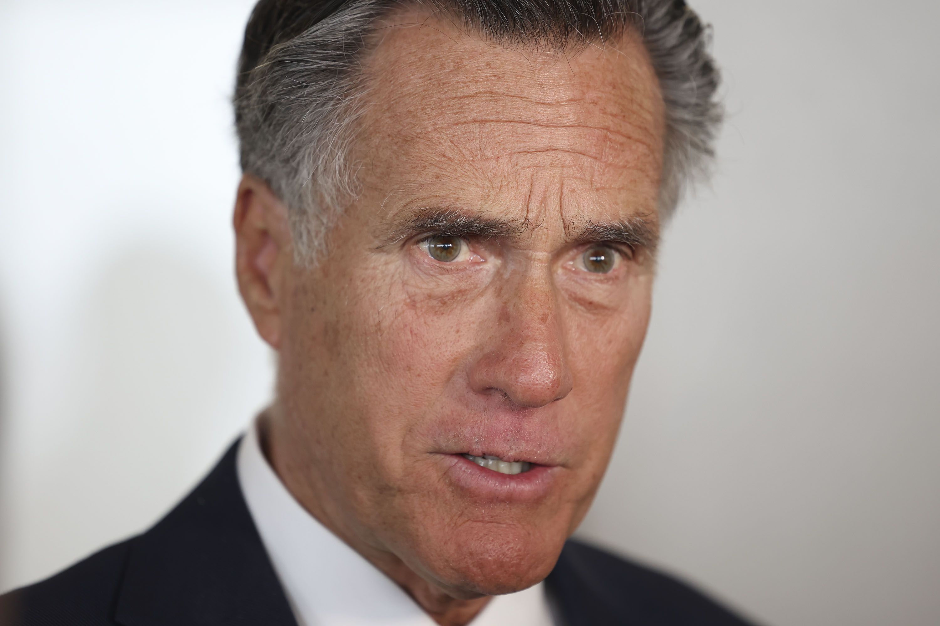 Sen. Mitt Romney speaks to reporters following an event with the Utah Aerospace and Defense Association at the Larry H. Miller Company in Sandy on Feb. 23. Romney may have dropped a clue Tuesday about whether or not he will run for reelection in 2024.