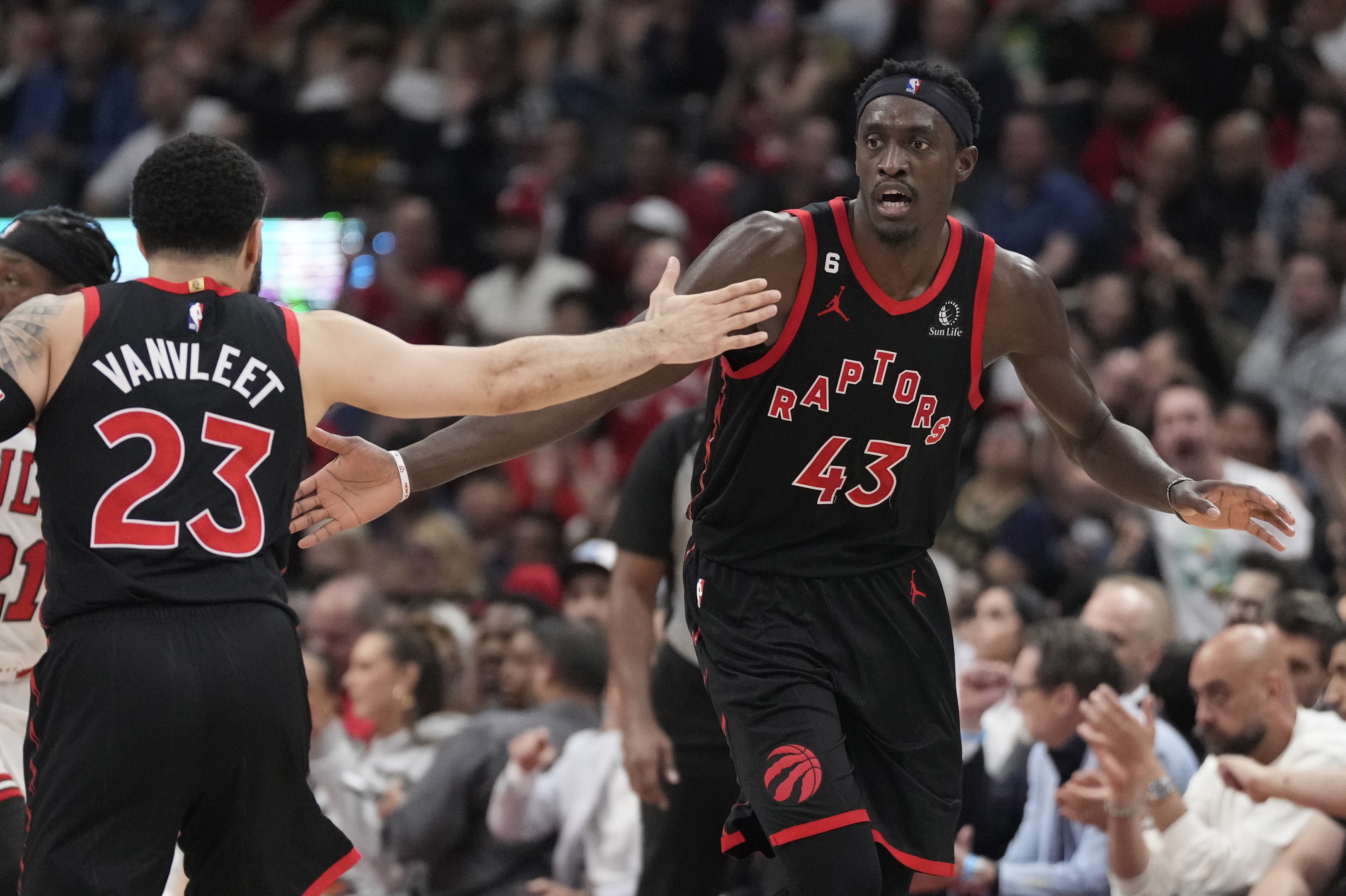 Toronto Raptors guard Fred VanVleet (23) and forward Pascal Siakam (43) react during the first half of the team's NBA basketball play-in tournament game against the Chicago Bulls on Wednesday, April 12, 2023, in Toronto. 