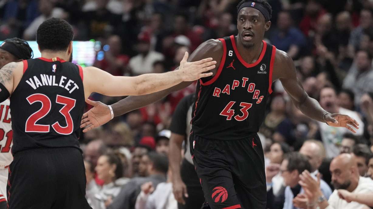 Toronto Raptors guard Fred VanVleet (23) and forward Pascal Siakam (43) react during the first half of the team's NBA basketball play-in tournament game against the Chicago Bulls on Wednesday, April 12, 2023, in Toronto.