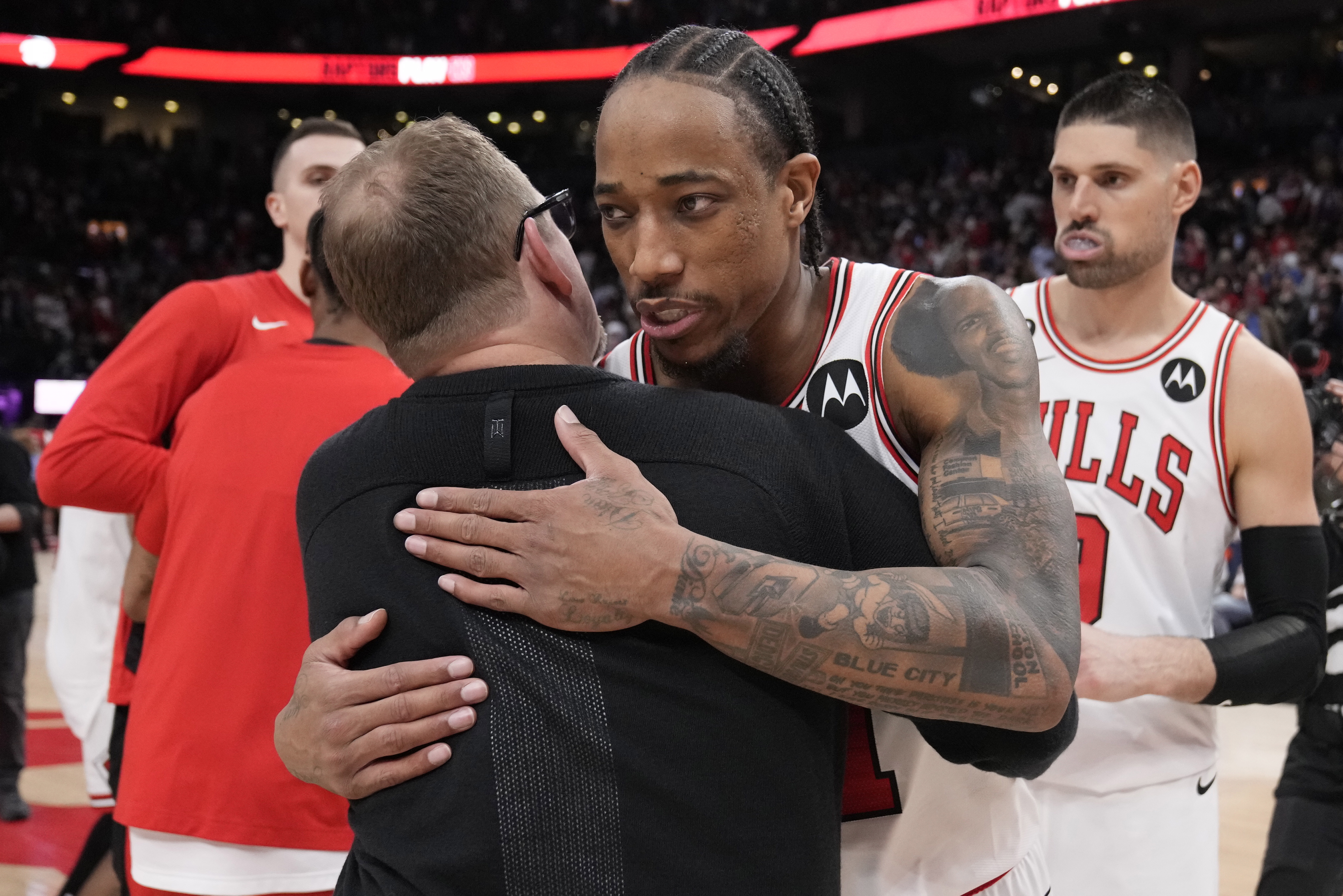 Chicago Bulls forward DeMar DeRozan greets Toronto Raptors coach Nick Nurse after the Bulls' win in an NBA basketball play-in tournament game Wednesday, April 12, 2023, in Toronto.