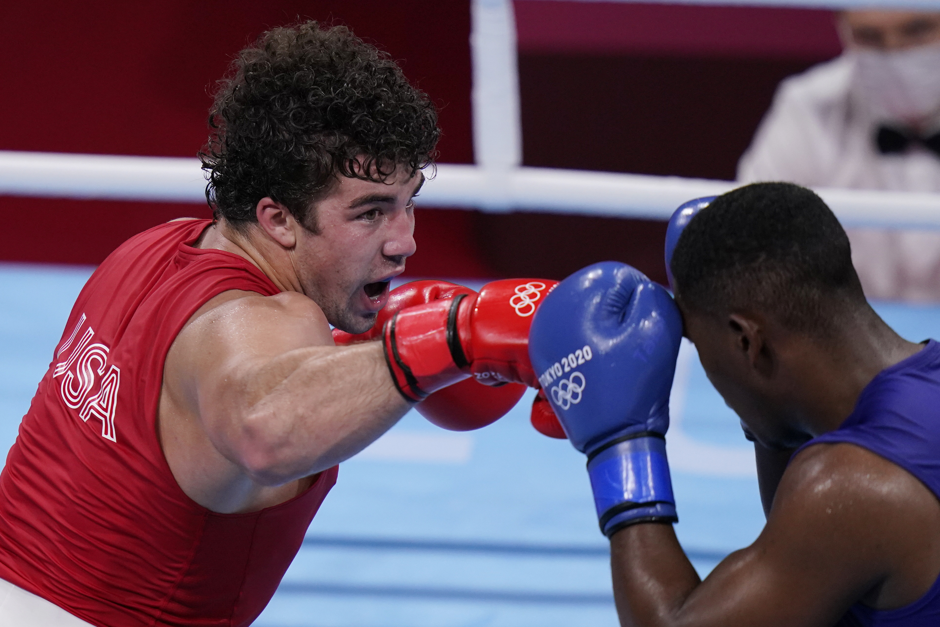 FILE - Richard Torrez Jr., from the United States, left, exchanges punches with Cuba's Dainier Pero during their men's super heavyweight over 91-kg boxing match at the 2020 Summer Olympics, Aug. 1, 2021, in Tokyo, Japan. American and British boxing officials have on Thursday, April 13, 2023 launched a breakaway group with the aim of saving boxing’s place at the Olympics, to be called World Boxing. Lauren Price of Britain, a gold medalist at the Tokyo Olympics in 2021, and silver medalist Richard Torrez Jr. of the United States are on the board as athlete representatives. 
