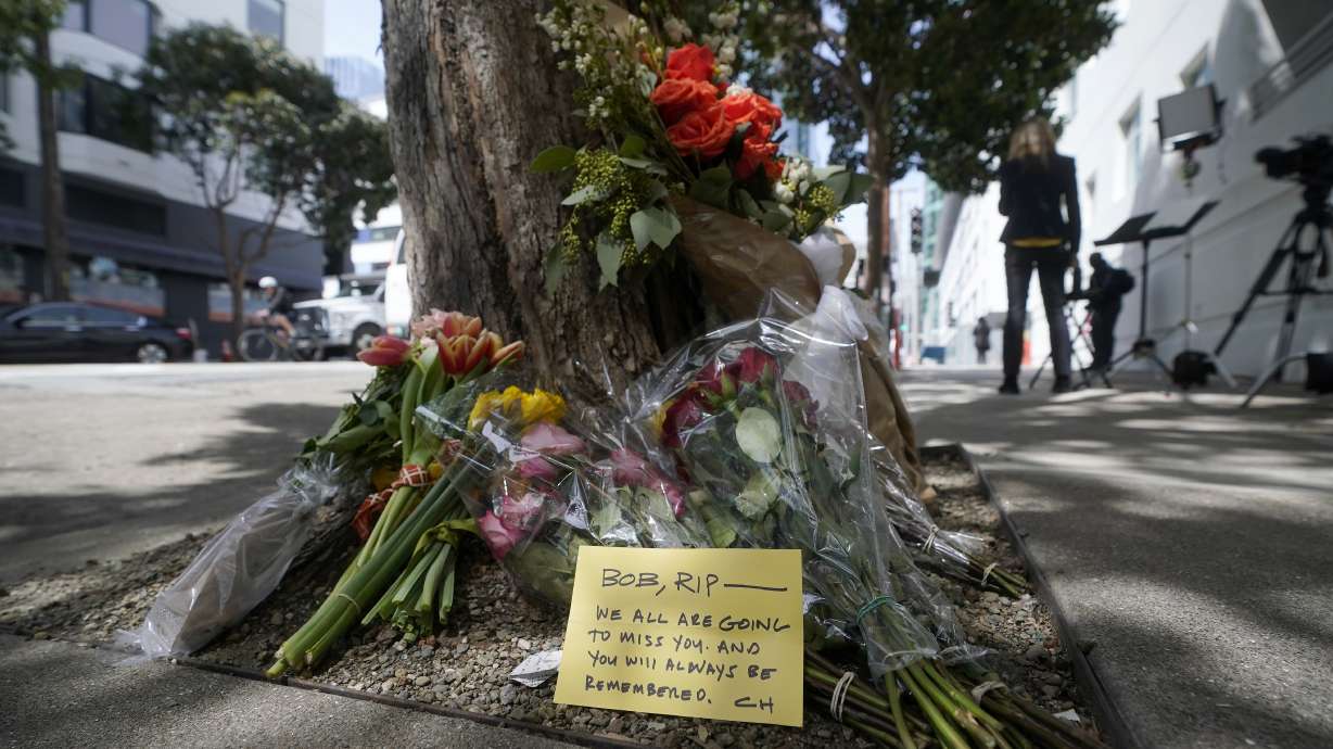 Flowers at a tree in front of the building where a technology executive was fatally stabbed near San Francisco, April 6. Details of how tech executive Bob Lee came to be fatally stabbed in downtown San Francisco early Tuesday were scarce as friends and family continued to mourn the man they called brilliant, kind and unlike others in the industry.