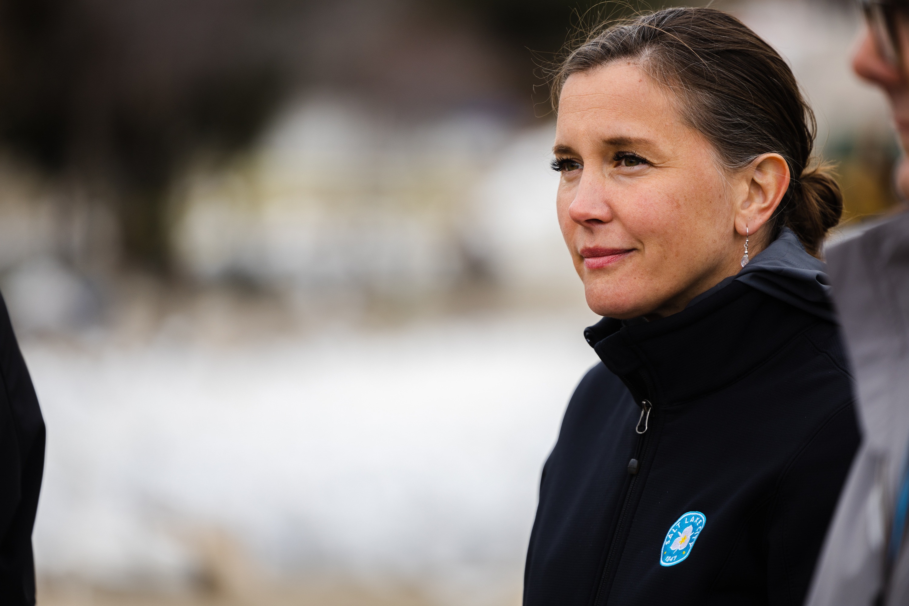 Salt Lake City Mayor Erin Mendenhall listens during a press conference on the flood mitigation at Emigration Creek in Salt Lake City on Thursday.