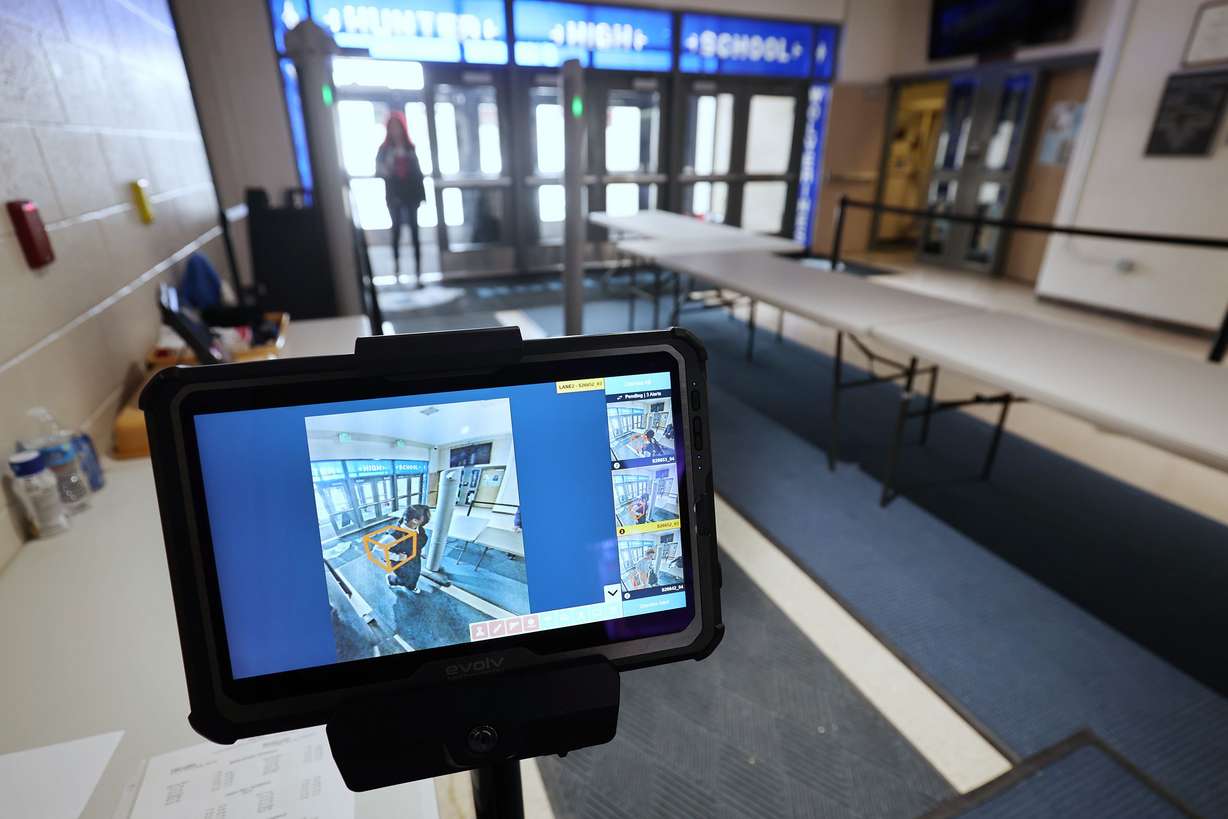 A student walks through the scanners at Hunter High School in West Valley City as they pilot a new technology that is helping to keep the school safer on April 4.