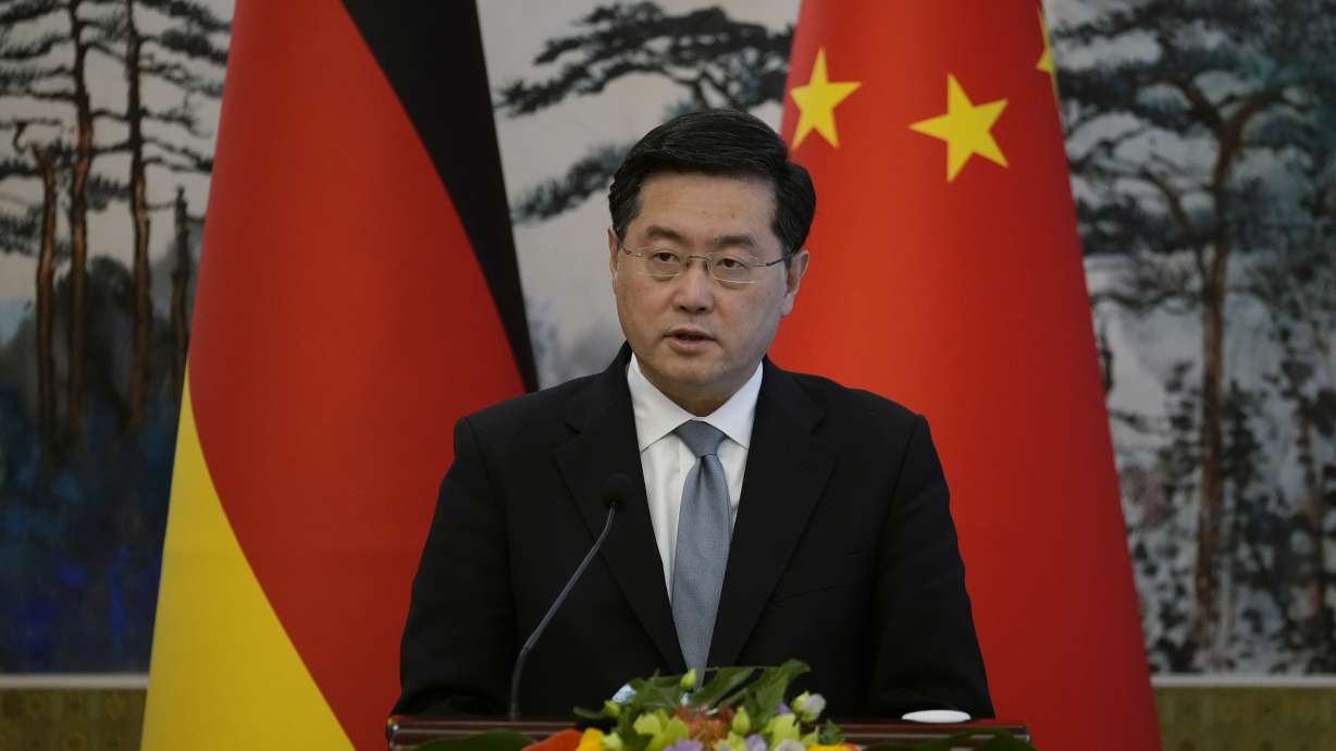 Chinese Foreign Minister Qin Gang speaks during a press conference with German Foreign Minister Annalena Baerbock in Beijing Friday. China's foreign minister says the country won't sell weapons to either side in the war in Ukraine.