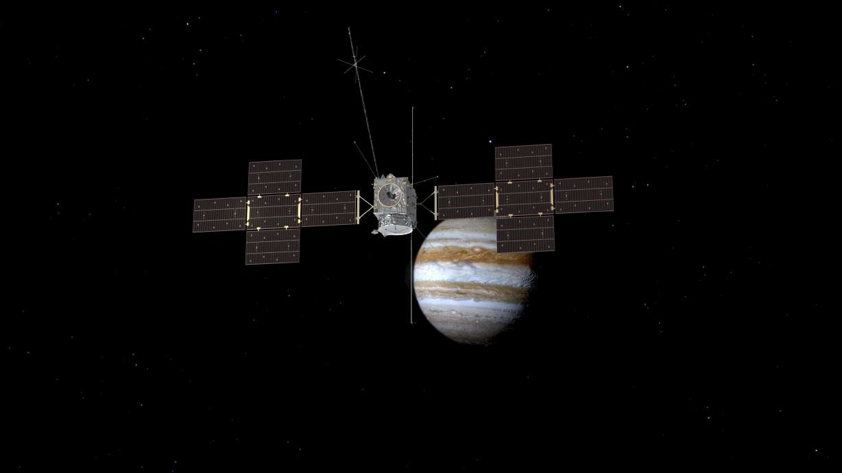 This image provided by the European Space Agency depicts the Jupiter Icy Moons Explorer, Juice, spacecraft orbiting the gas giant. This robotic explorer set off on an eight-year journey Friday from French Guiana in South America, launching atop an Ariane rocket.