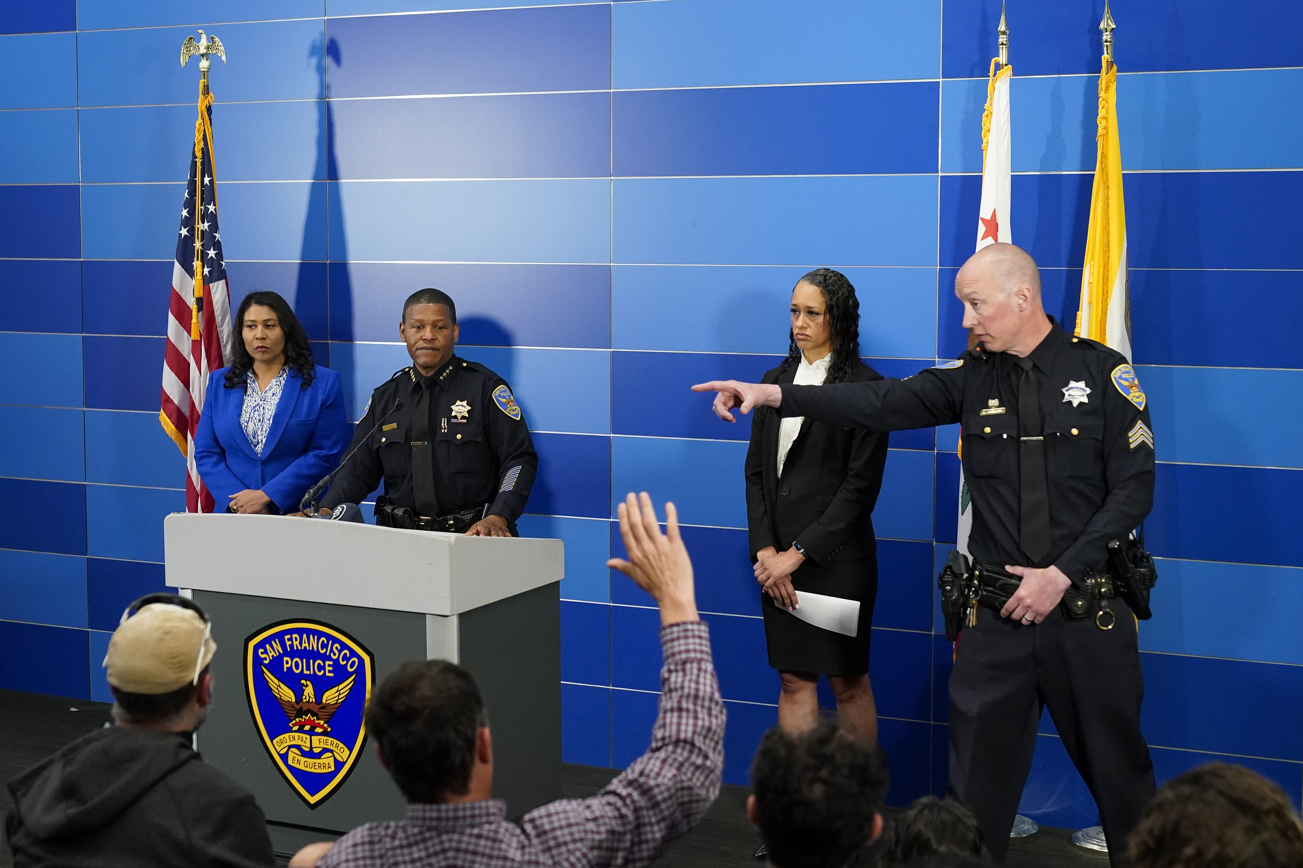 San Francisco Police Chief William Scott, second from left, answers questions from reporters during a press conference where officials announced the arrest of a suspect in the homicide investigation of Robert Lee, Thursday in San Francisco. San Francisco prosecutors say the tech consultant charged with the killing of Cash App founder Bob Lee planned the attack.