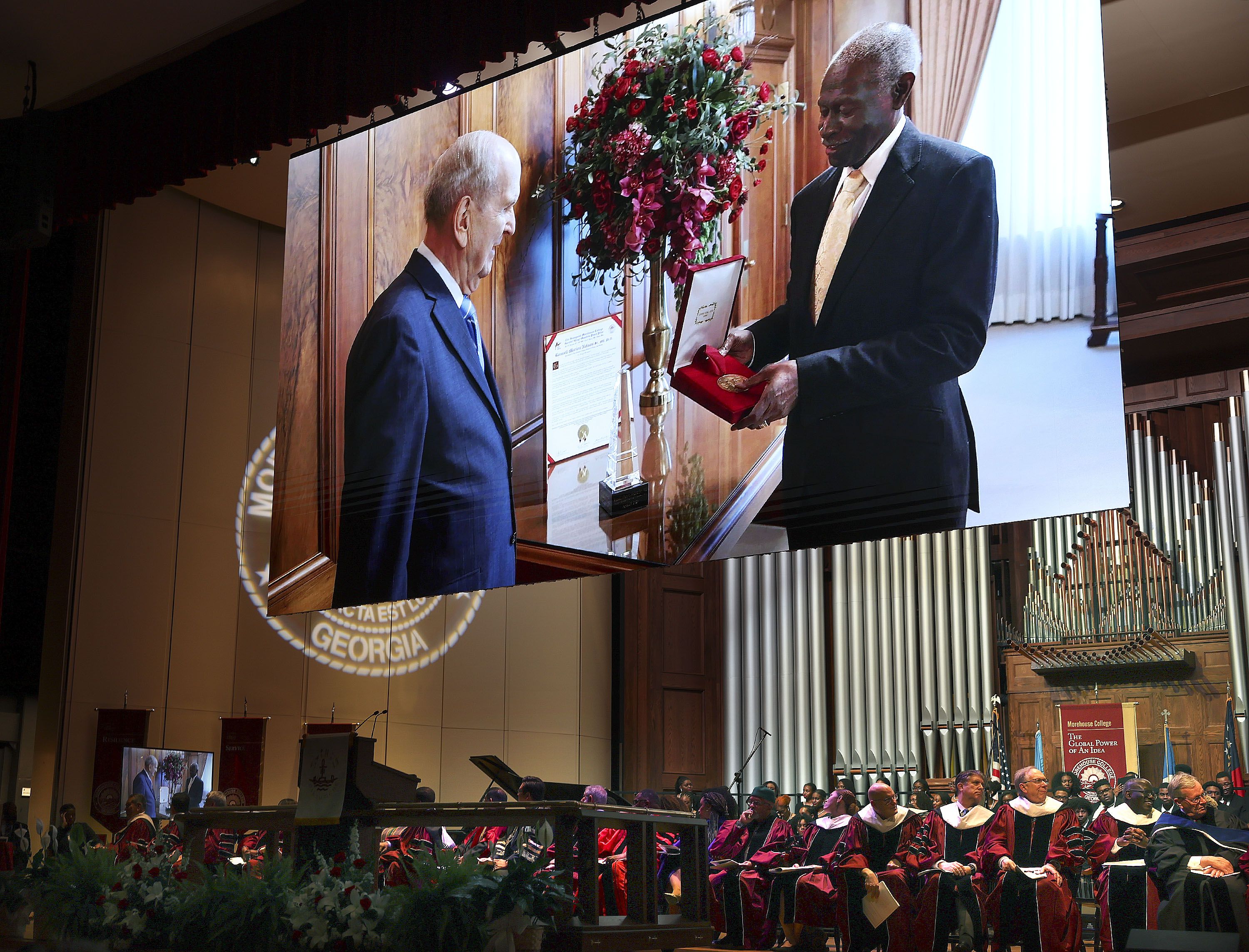 President Russell M. Nelson receives the Gandi-King-Mandela Peace Prize from Dr. Lawrence Edward Carter Sr., professor and founding dean of the Martin Luther King Jr. International Chapel, in Atlanta on Thursday.