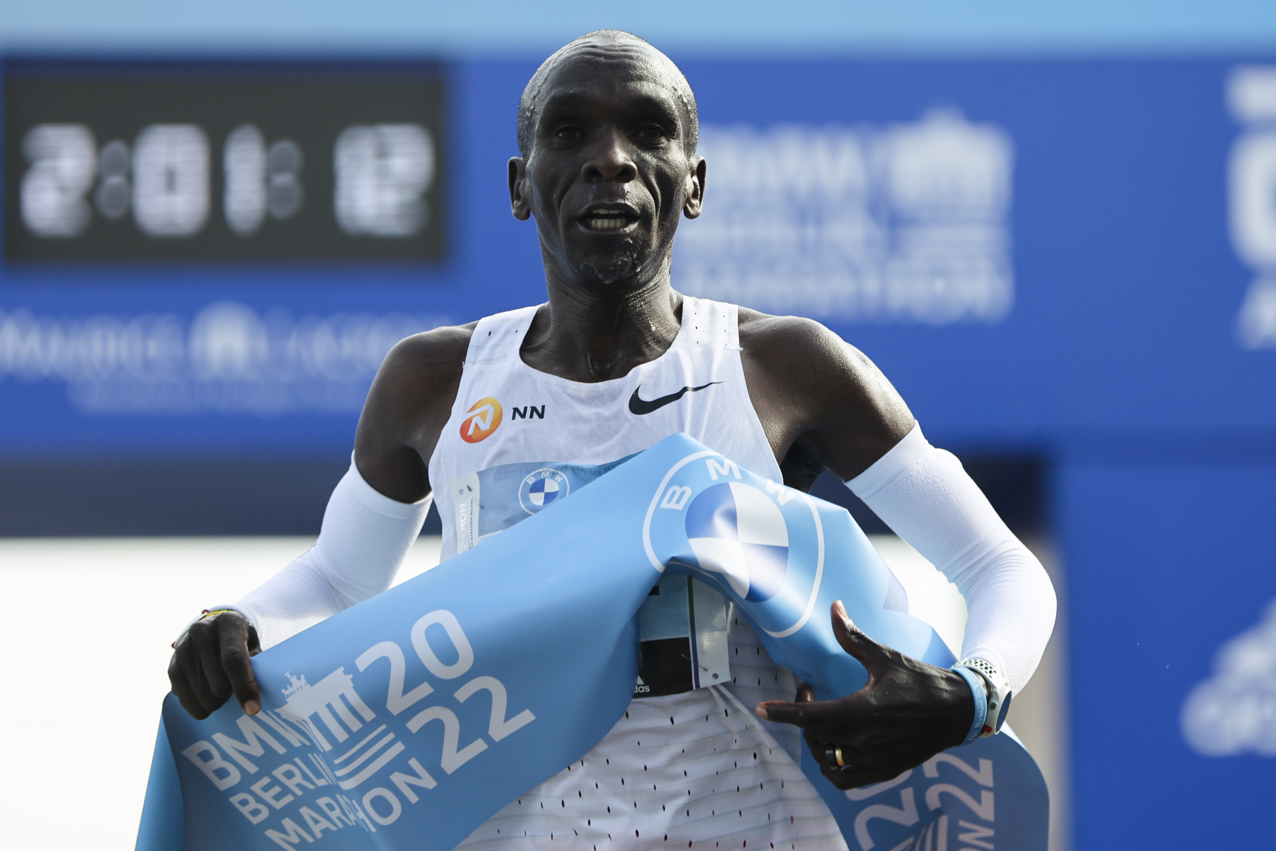FILE - Kenya's Eliud Kipchoge crosses the line to win the Berlin Marathon in Berlin, Germany, Sept. 25, 2022. A 38-year-old who has been collecting marathon victories since 2013, Kipchoge will make his Boston Marathon debut on Monday, April 17, 2023, in the 127th edition of the world’s longest-running long run. A victory would give him wins in an unprecedented five of the six major marathons. 