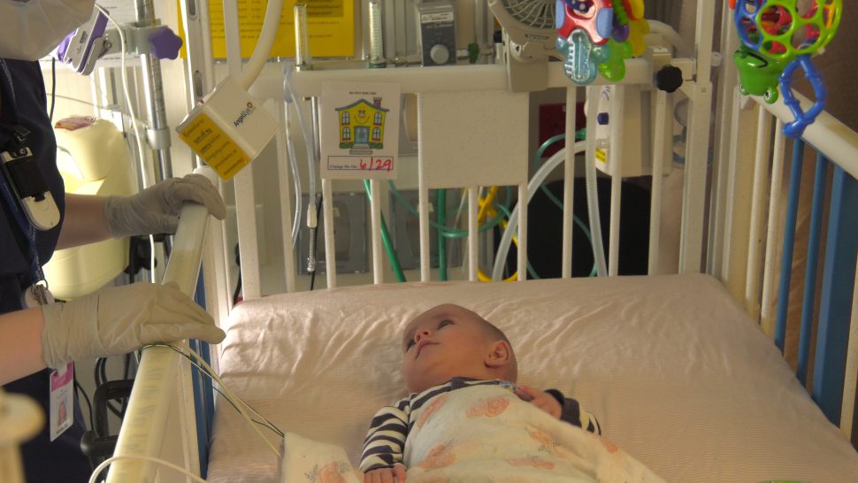 A baby is looked over by both a caregiver and a special camera system in the NICU at Primary Children’s Hospital in Salt Lake City. A St. George hospital recently installed NICU cameras so parents of preemies can look after their babies virtually.