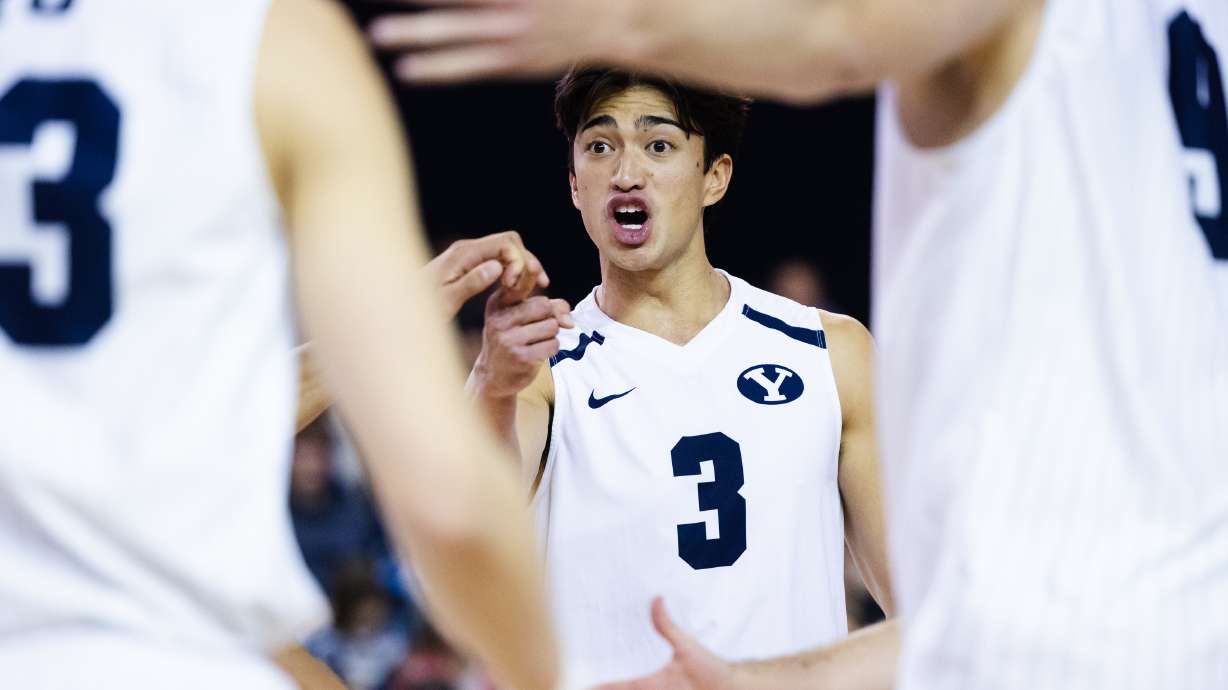 Brigham Young’s Kupono Browne (3) celebrates after a point during an NCAA mens volleyball match at the George Albert Smith Fieldhouse in Provo on Friday, Feb. 10, 2023.