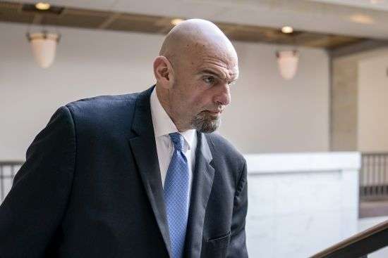Sen. John Fetterman, D-Pa., leaves an intelligence briefing on the unknown aerial objects the U.S. military shot down this weekend at the Capitol in Washington, Feb. 14. Fetterman will be returning to the Senate on Monday after being hospitalized for clinical depression in February.