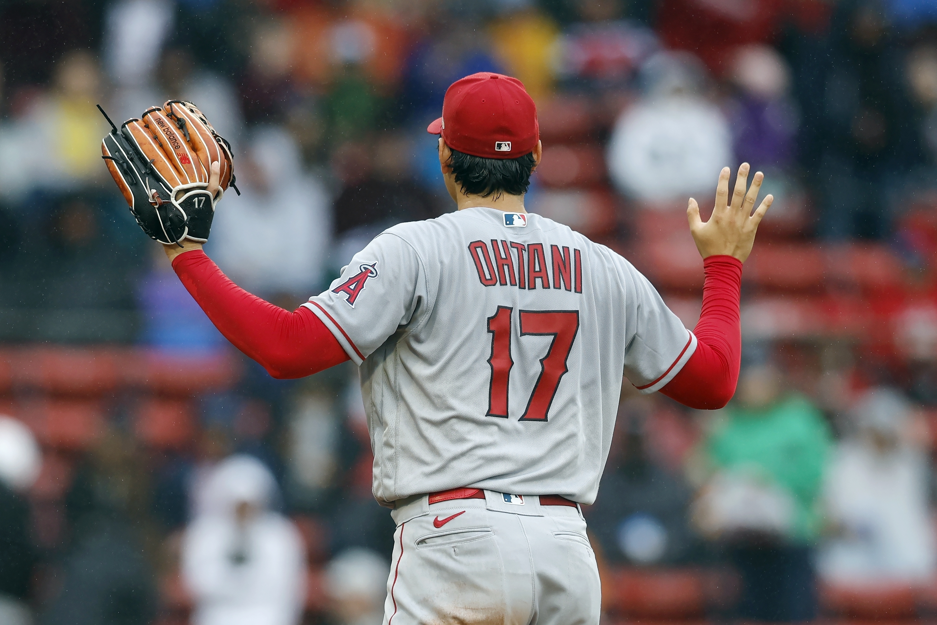 Los Angeles Angels' Shohei Ohtani signals to his dugout during the second inning of a baseball game against the Boston Red Sox, Monday, April 17, 2023, in Boston. 