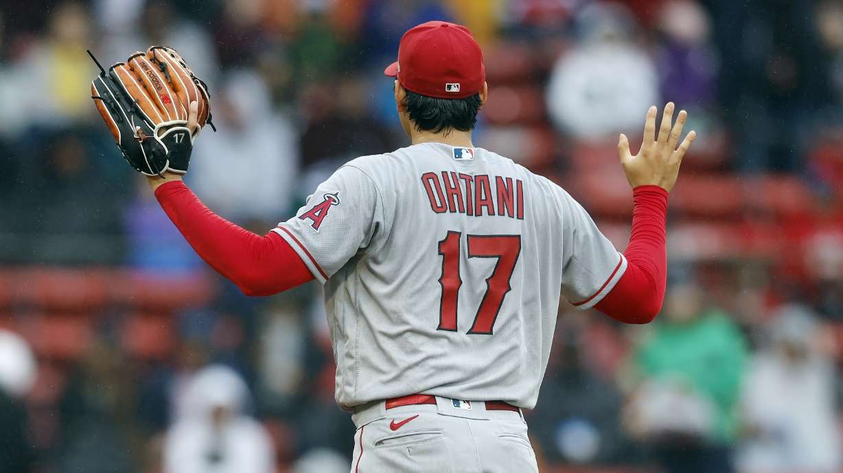 Los Angeles Angels' Shohei Ohtani signals to his dugout during the second inning of a baseball game against the Boston Red Sox, Monday, April 17, 2023, in Boston.