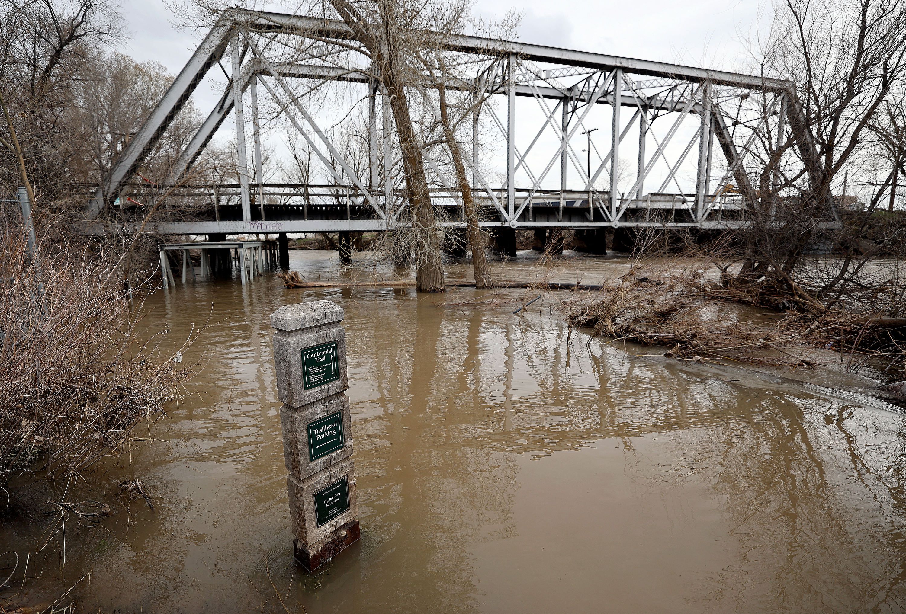 The Centennial Trail is flooded from an overflowing Weber River in West Haven on Monday. How much has the winter affected the drought?
