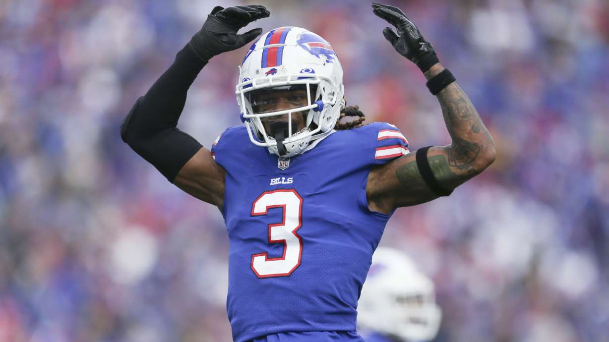 FILE - Buffalo Bills safety Damar Hamlin reacts after a play during the first half of the team's NFL football game against the Pittsburgh Steelers on Oct. 9, 2022, in Orchard Park, Hamlin has been cleared to resume playing and is attending the team’s voluntary workout program some four months after going into cardiac arrest and having to be resuscitated on the field during a game at Cincinnati, general manager Brandon Beane said Tuesday, April 18, 2023.