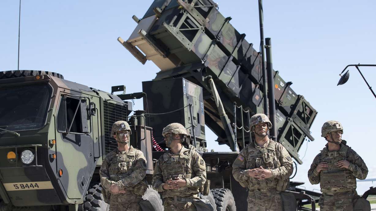 Members of the U.S. 10th Army Air and Missile Defense Command stand next to a Patriot surface-to-air missile battery during the NATO multinational in Lithuania on July 20, 2017. Ukraine’s defense minister said Wednesday his country has received U.S.-made Patriot surface-to-air guided missile systems it has long craved and which Kyiv hopes will help shield it from Russian strikes during the war.