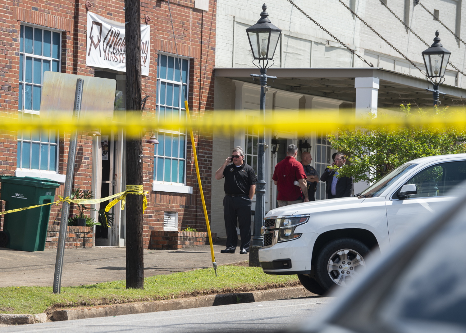 Law enforcement continues to investigate a mass shooting at Mahogany Masterpiece dance studio in Dadeville, Ala., on Sunday. Alabama investigators say two teenagers have been arrested and charged with murder.